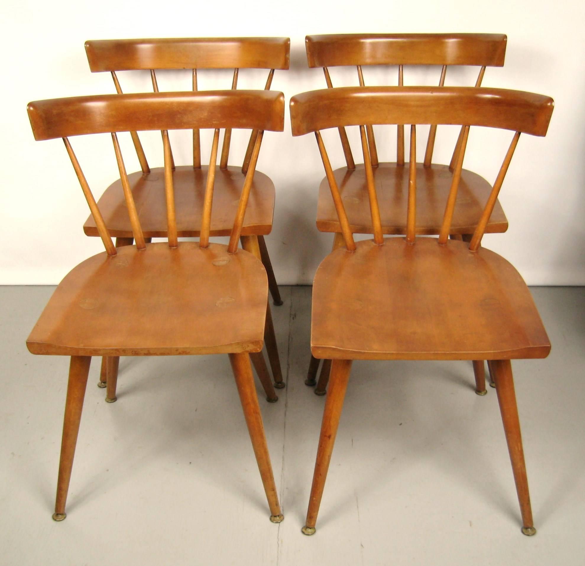 Maple Paul McCobb dining chairs set of four, Planner Group. They are in wonderful vintage condition. Measuring: H 30 in, W 17 in, D 19 in, seat height 17 in.  Be sure to check our storefront for many more decorating ideas, from primitives, Machine