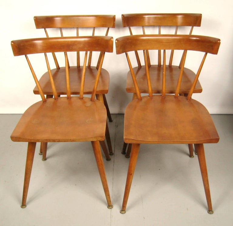 Maple Paul McCobb dining chairs set of four, Planner Group. They are in wonderful vintage condition. Measuring: H 30 in, W 17 in, D 19 in, seat height 17 in.  Be sure to check our storefront for many more decorating ideas, from primitives, Machine