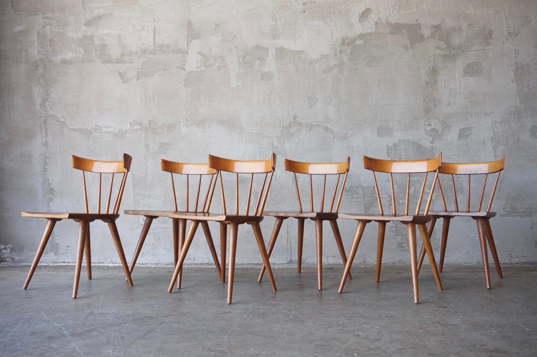 Beautiful set of 6 dining or side chairs, in solid maple, by Paul McCobb for Winchendon, circa 1950. 

This set is in very good original condition. Much less than typical wear than to be expected with age. Typical light scuffs to legs and seat