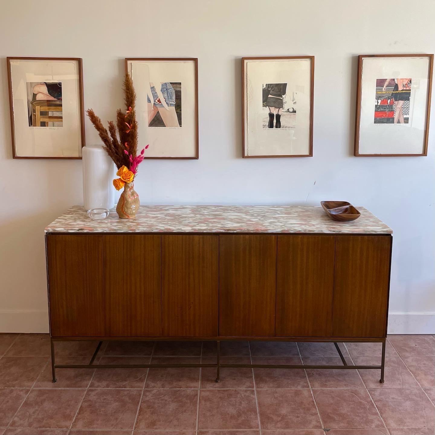 Paul McCobb for Directional, produced by Calvin Furniture, under the “Irwin Collection”. Iconic modern American design. Dual trifold doors open to reveal two large drawers, and adjustable-height shelves. Some minor wear as shown; small chips to body