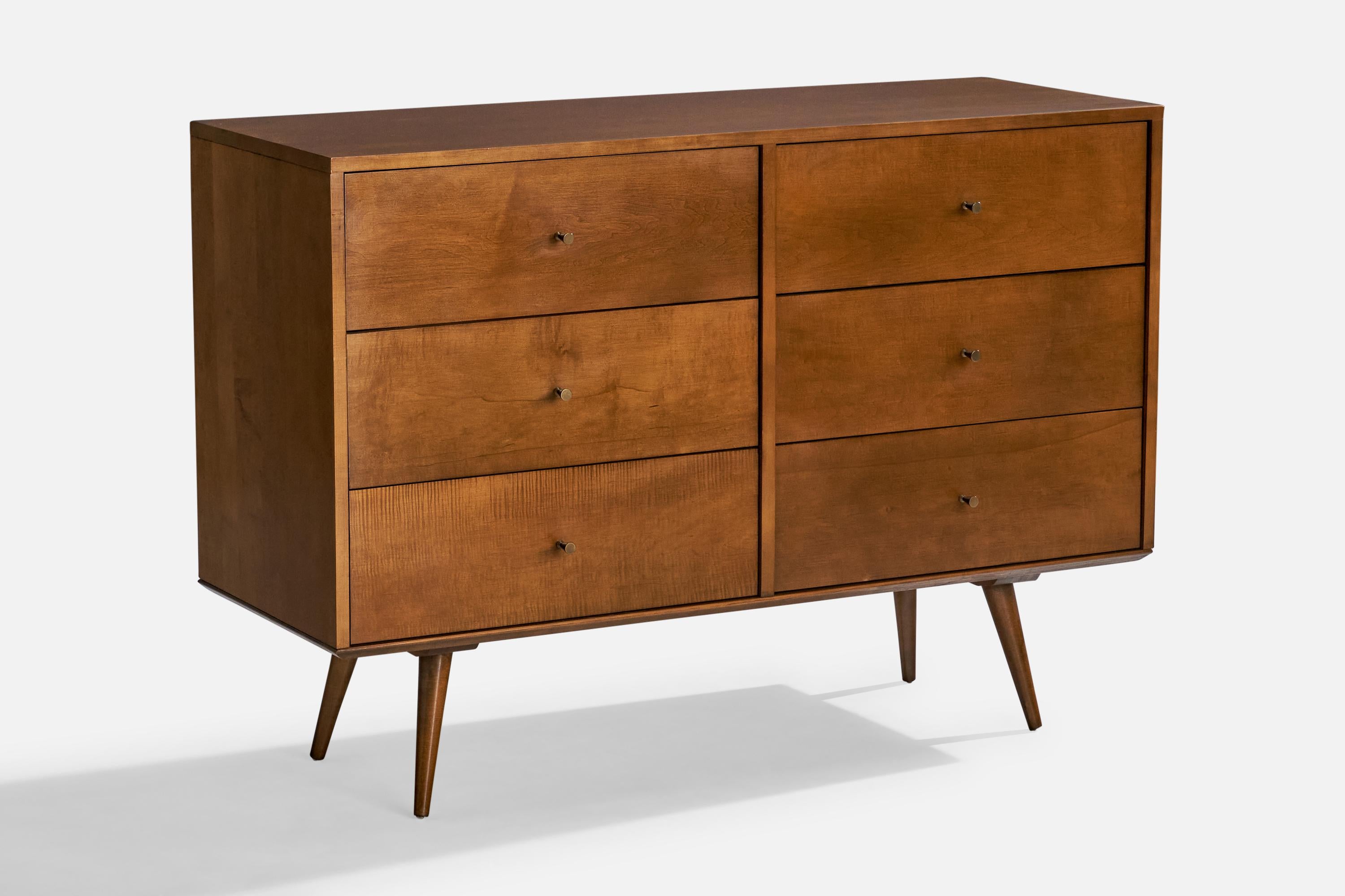 A dark-stained maple and brass dresser designed by Paul McCobb and produced by Planner Group, USA, c. 1950s.

Overall Dimensions: 34.1” H x 48.1” W x 18.2” D

Dresser Dimensions: 24.1” x 48.1” W x 18.2” D

Table Dimensions: 10” H x 48” W x 18.2” D