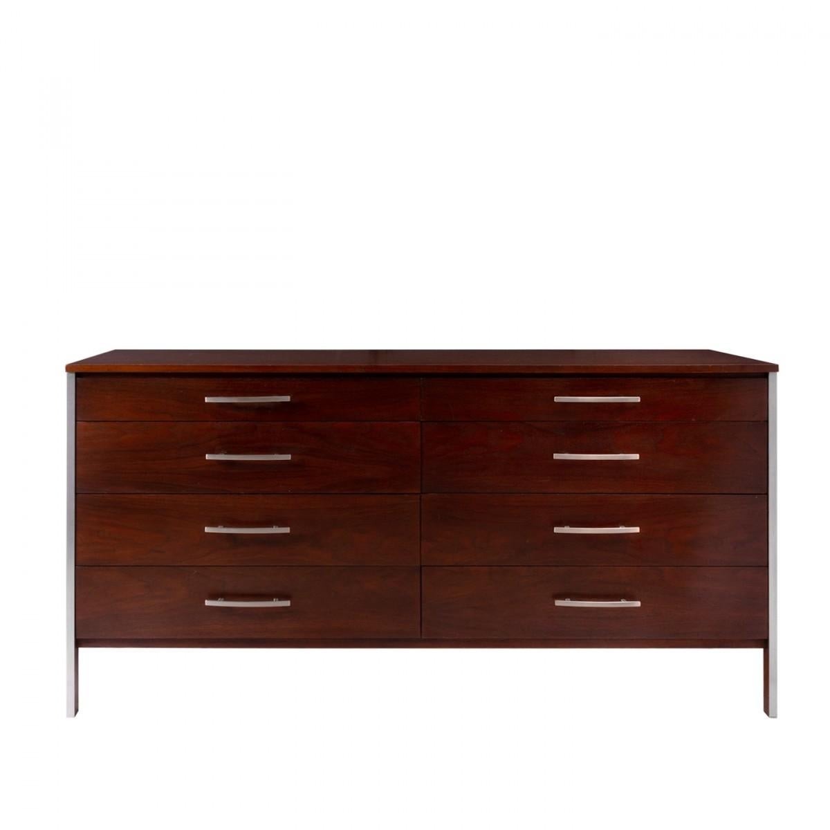 A walnut dresser with eight drawers, complemented by a steel frame and hardware. Designed by Paul McCobb for Calvin Furniture. Signed. USA, circa 1950.

Dimensions: 66