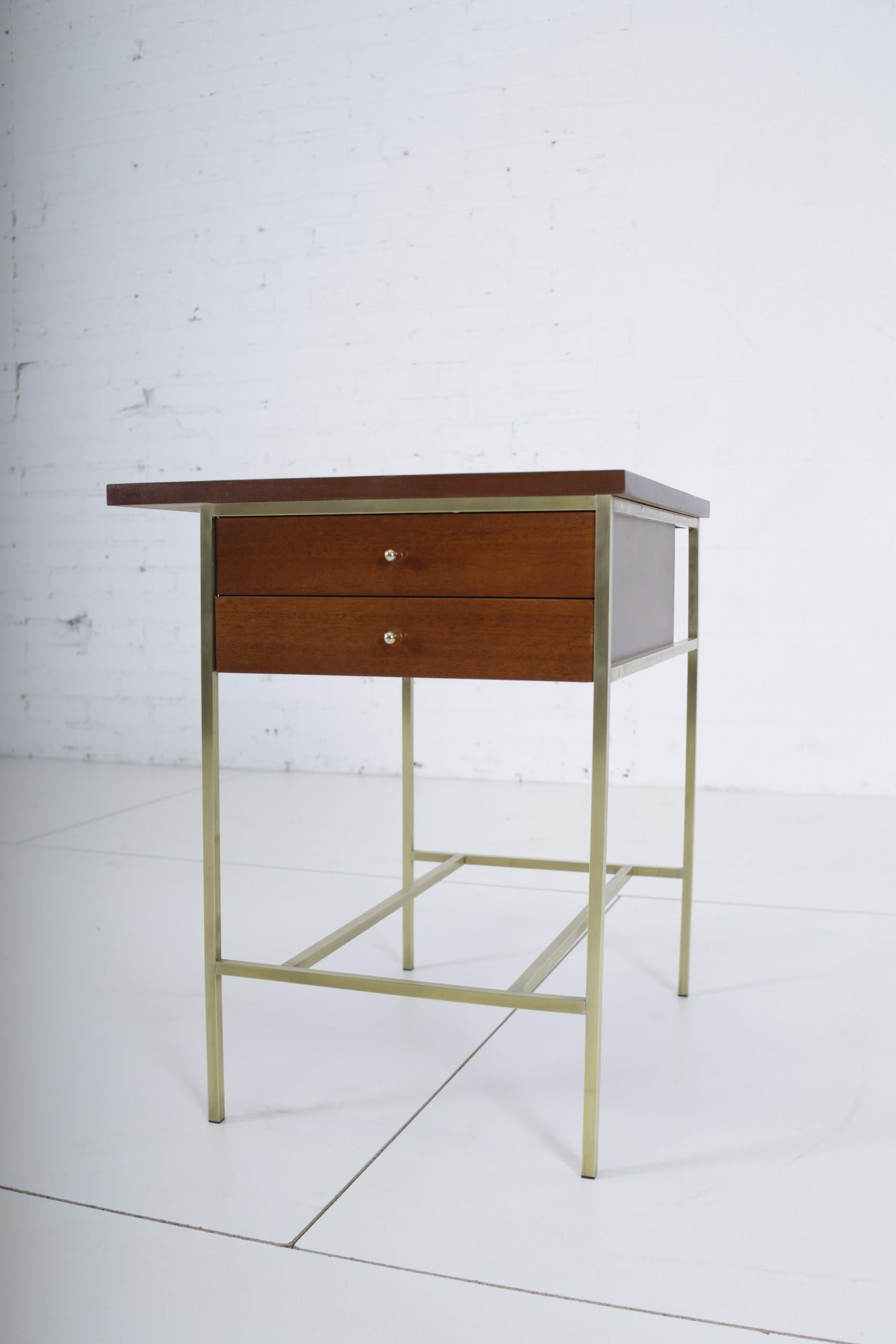 Side table or nightstand by Paul McCobb for Calvin Furniture. Fully restored/refinished. Brass frame with walnut tone finish.