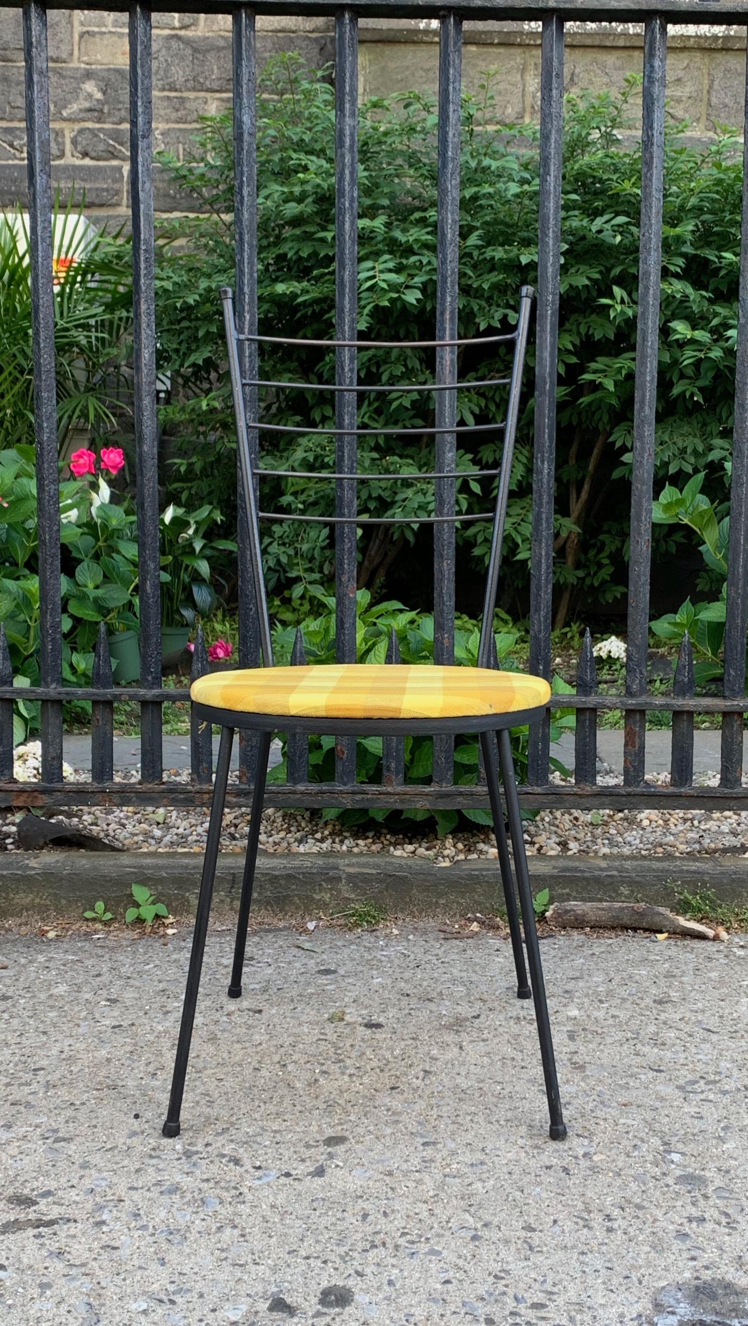 Paul McCobb for Arbuck Inc of Brooklyn, NY.  Black wrought iron hairpin chair, c. 1951, minimal modern lines.  6 available. Priced per chair. Stackable. Indoor / outdoor. Great lines, sturdy form.