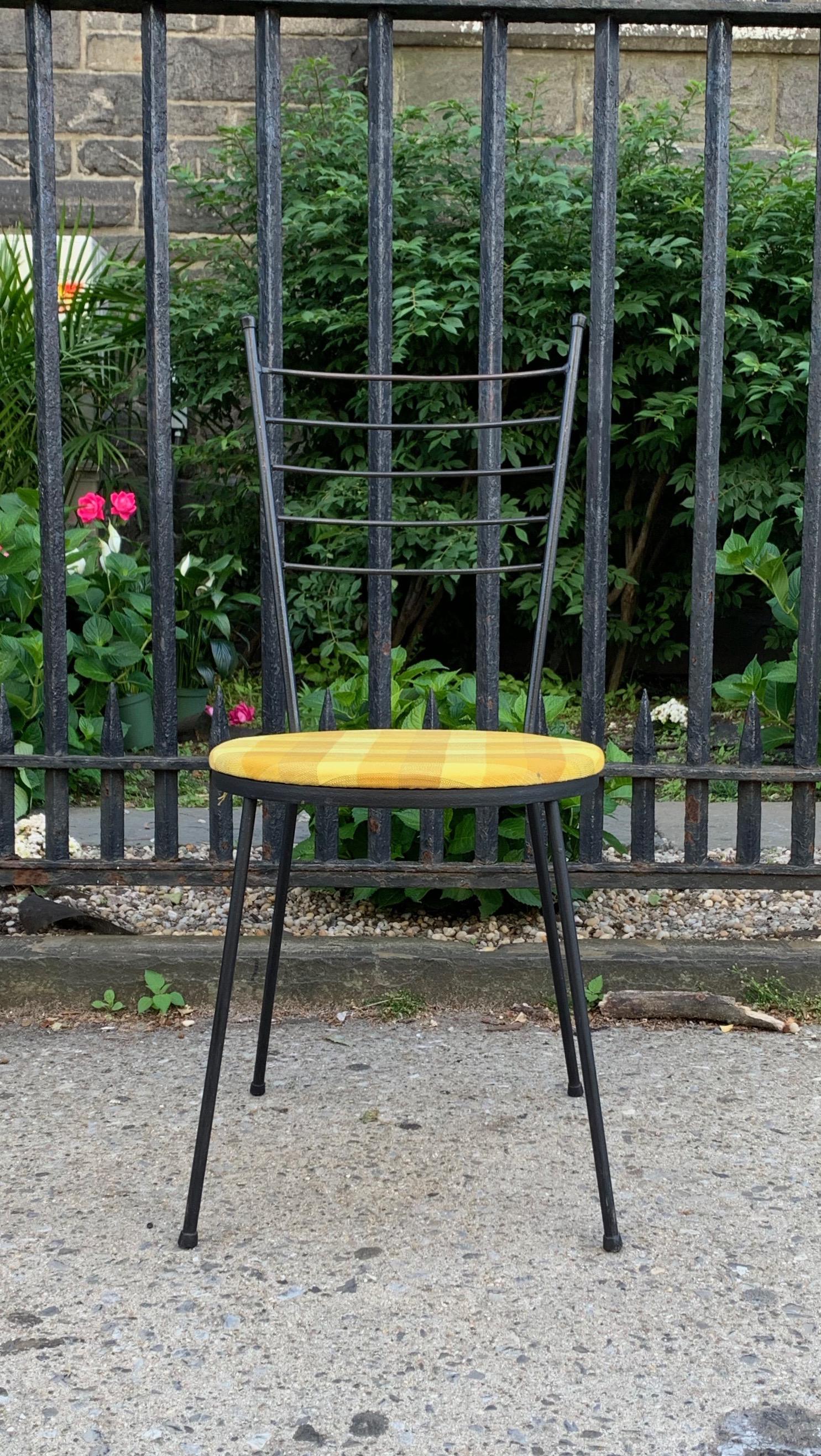 Paul McCobb for Arbuck Inc of Brooklyn, NY.  Black wrought iron hairpin chair, c. 1951, minimal modern lines.  6lavailable. Priced per chair. Stackable. Indoor / outdoor. Great lines, sturdy form.