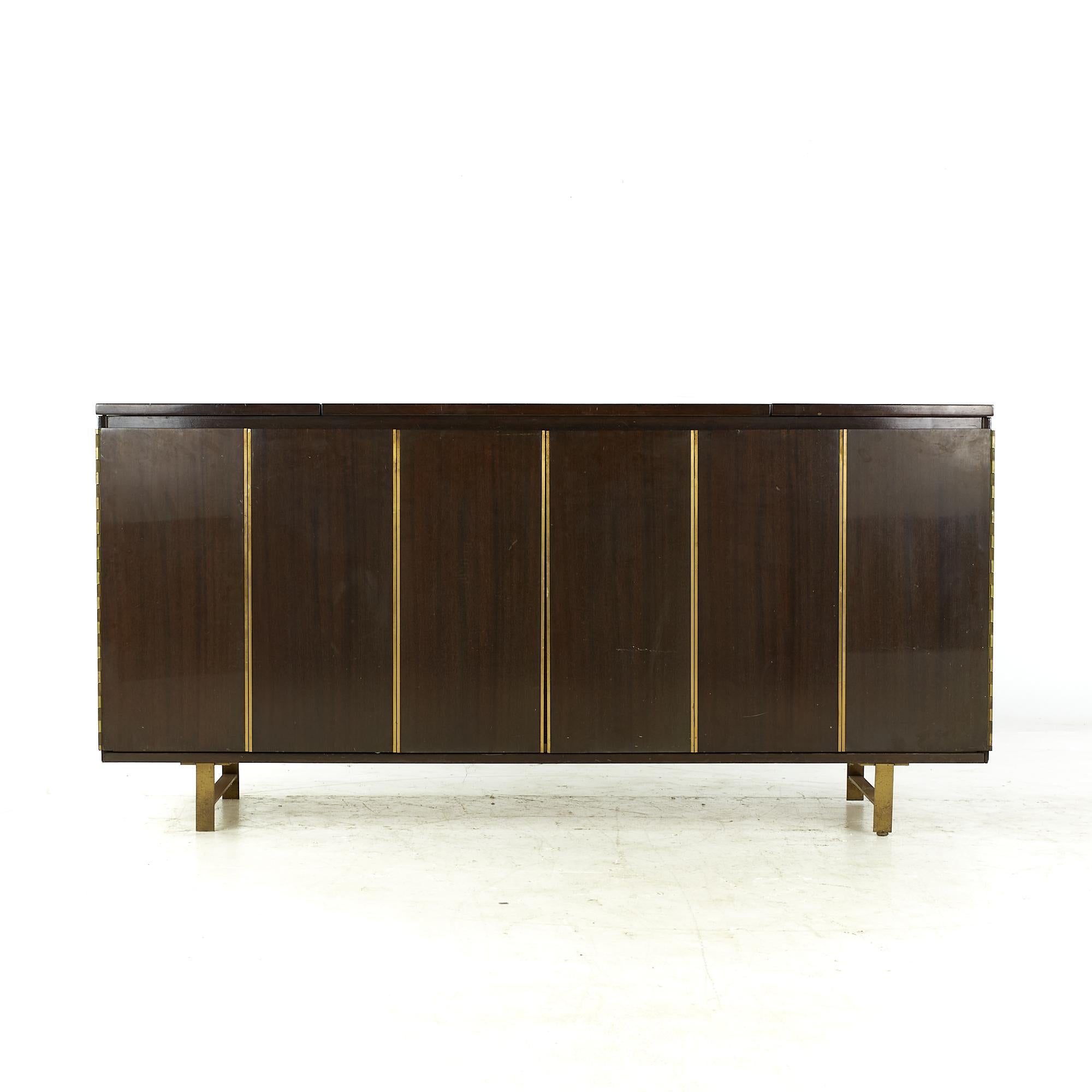 Paul McCobb for Bell & Howell midcentury Hi-Fi radio console.

This console measures: 72 wide x 19 deep x 34.75 inches high.

All pieces of furniture can be had in what we call restored vintage condition. That means the piece is restored upon