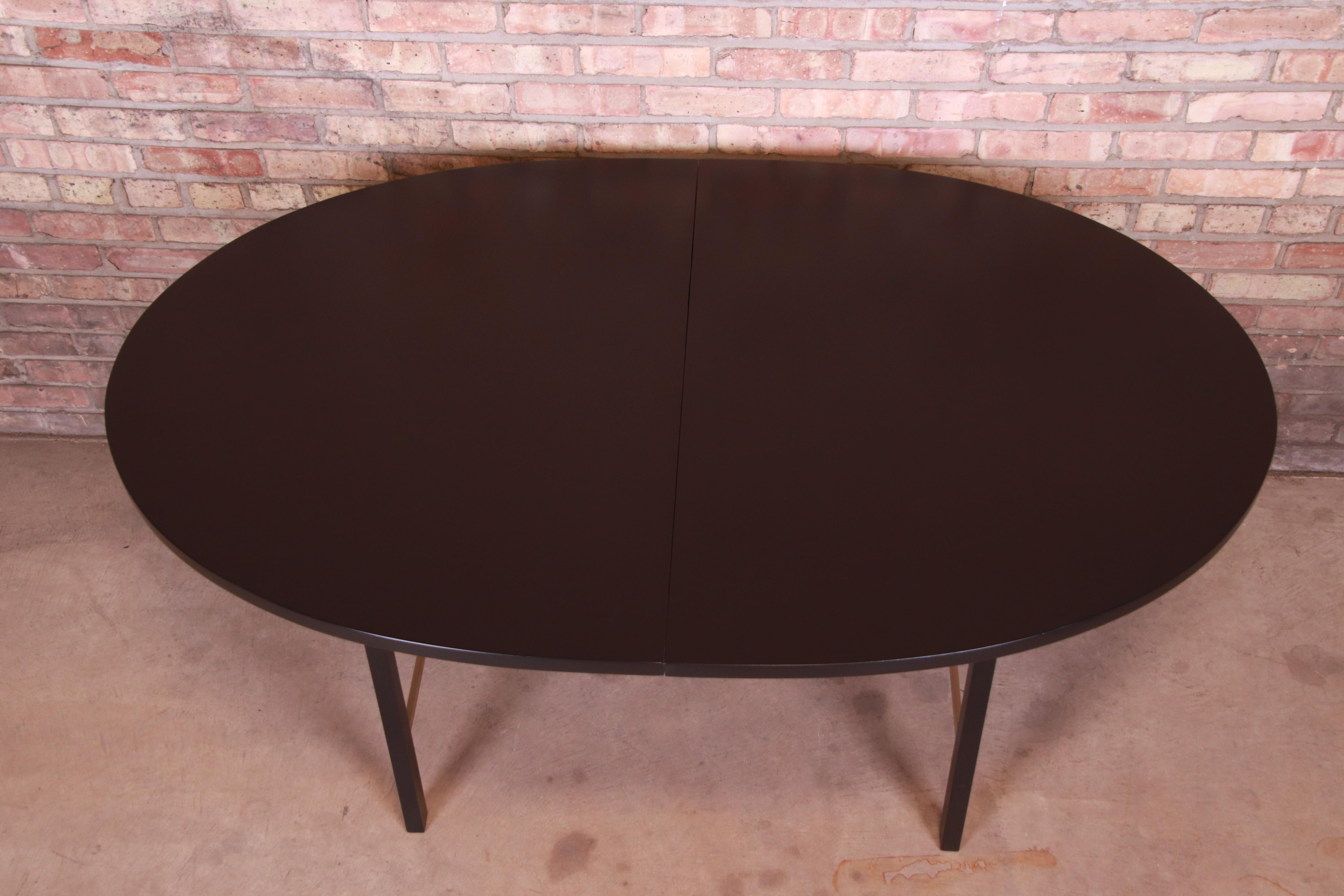 Paul McCobb for Calvin Black Lacquer and Brass Dining Table, Newly Refinished For Sale 4