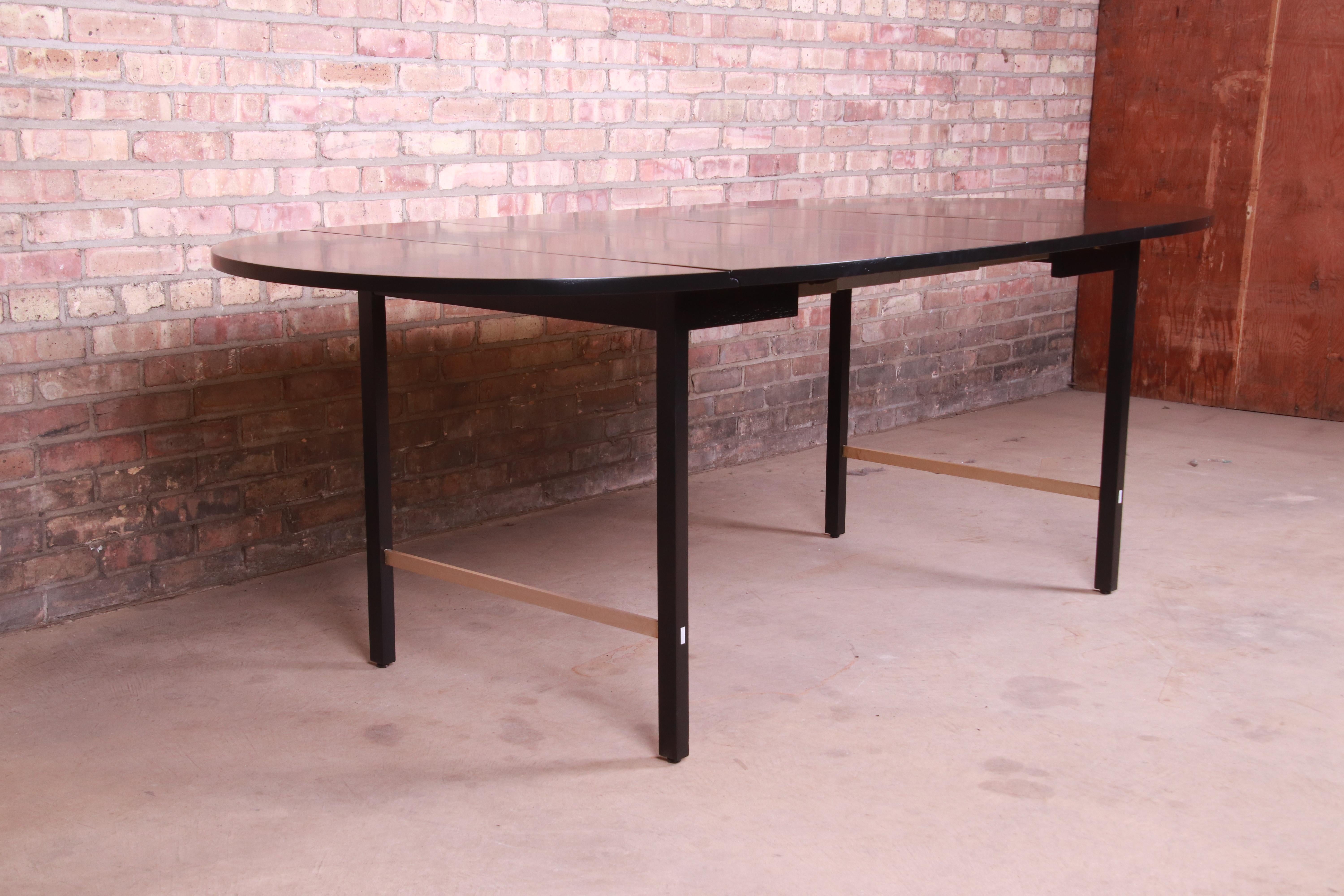 Paul McCobb for Calvin Black Lacquer and Brass Dining Table, Newly Refinished In Good Condition In South Bend, IN