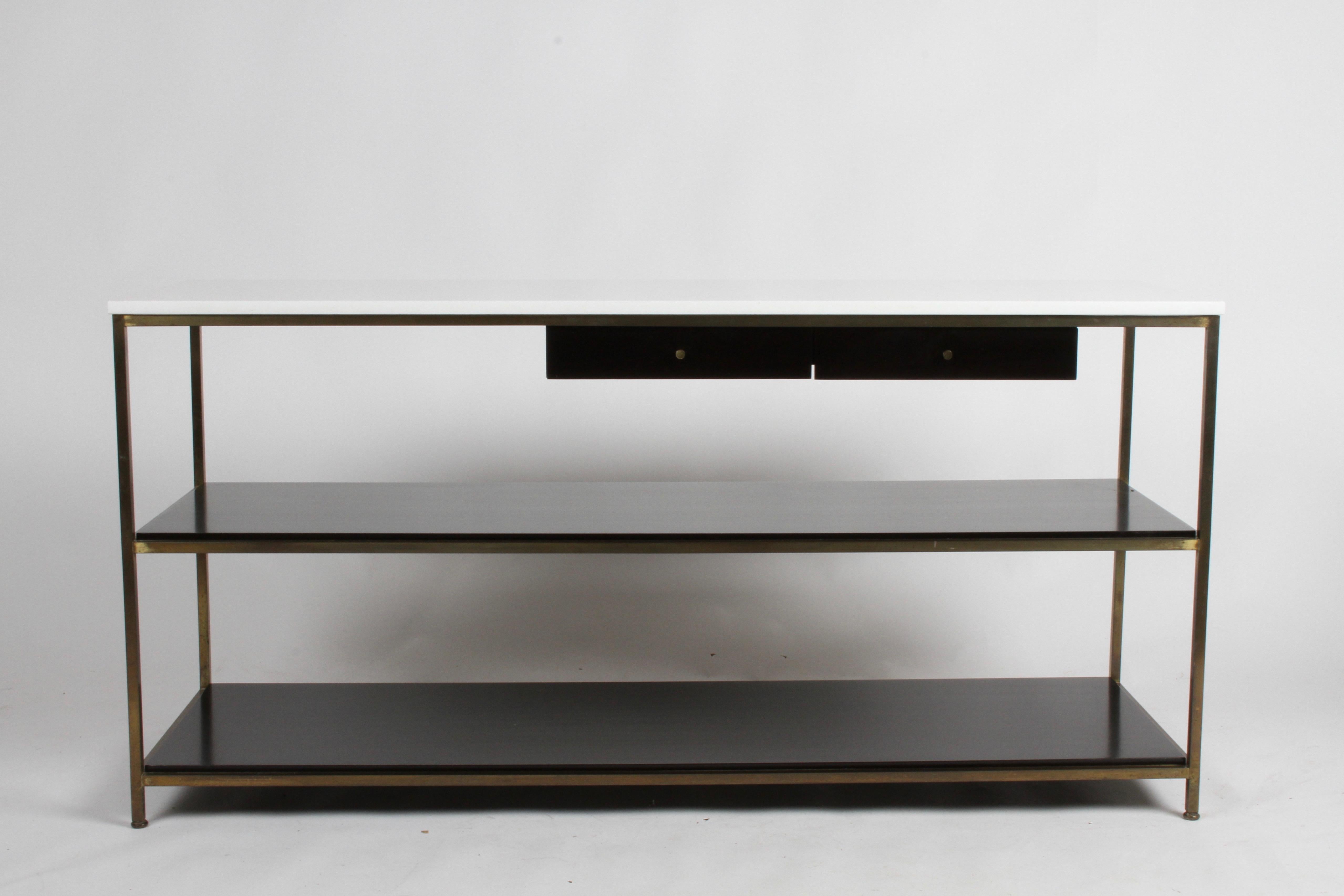 Mid-Century Modern console table or server designed by Paul McCobb for Calvin Furniture, part of his Irwin collection. Console has two drawers and two lower shelves in mahogany that have been refinished in dark espresso, and supported by brass frame