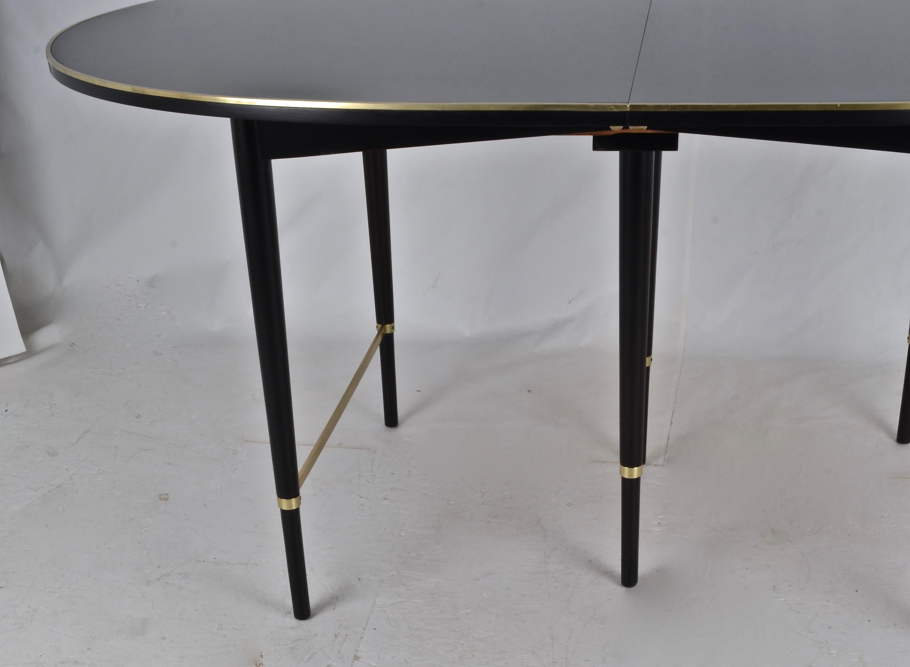 Mid-20th Century Paul McCobb for Calvin Ebonized Dining Table with Six Leaves, USA, circa 1950s