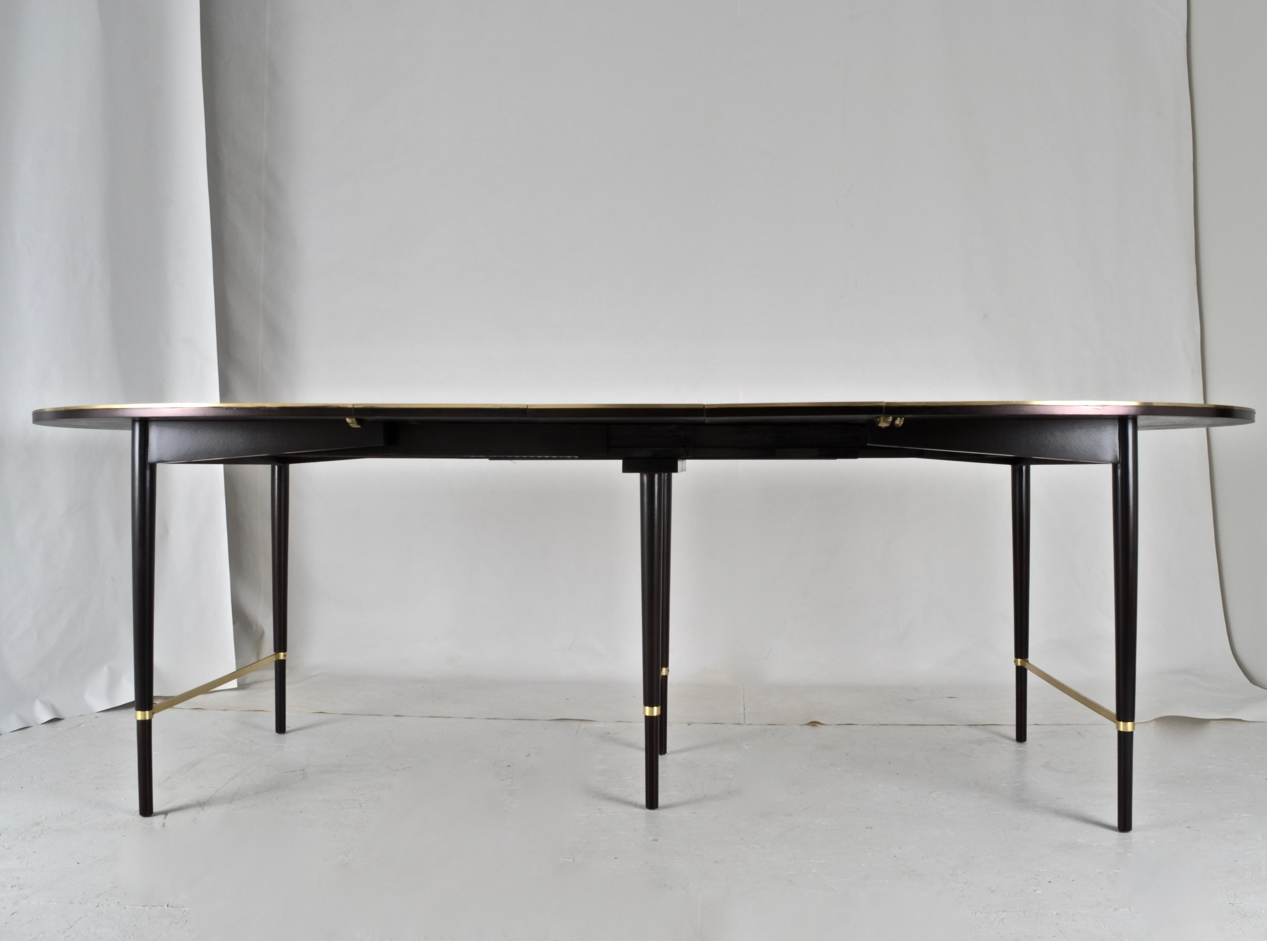 Brass Paul McCobb for Calvin Ebonized Dining Table with Six Leaves, USA, circa 1950s