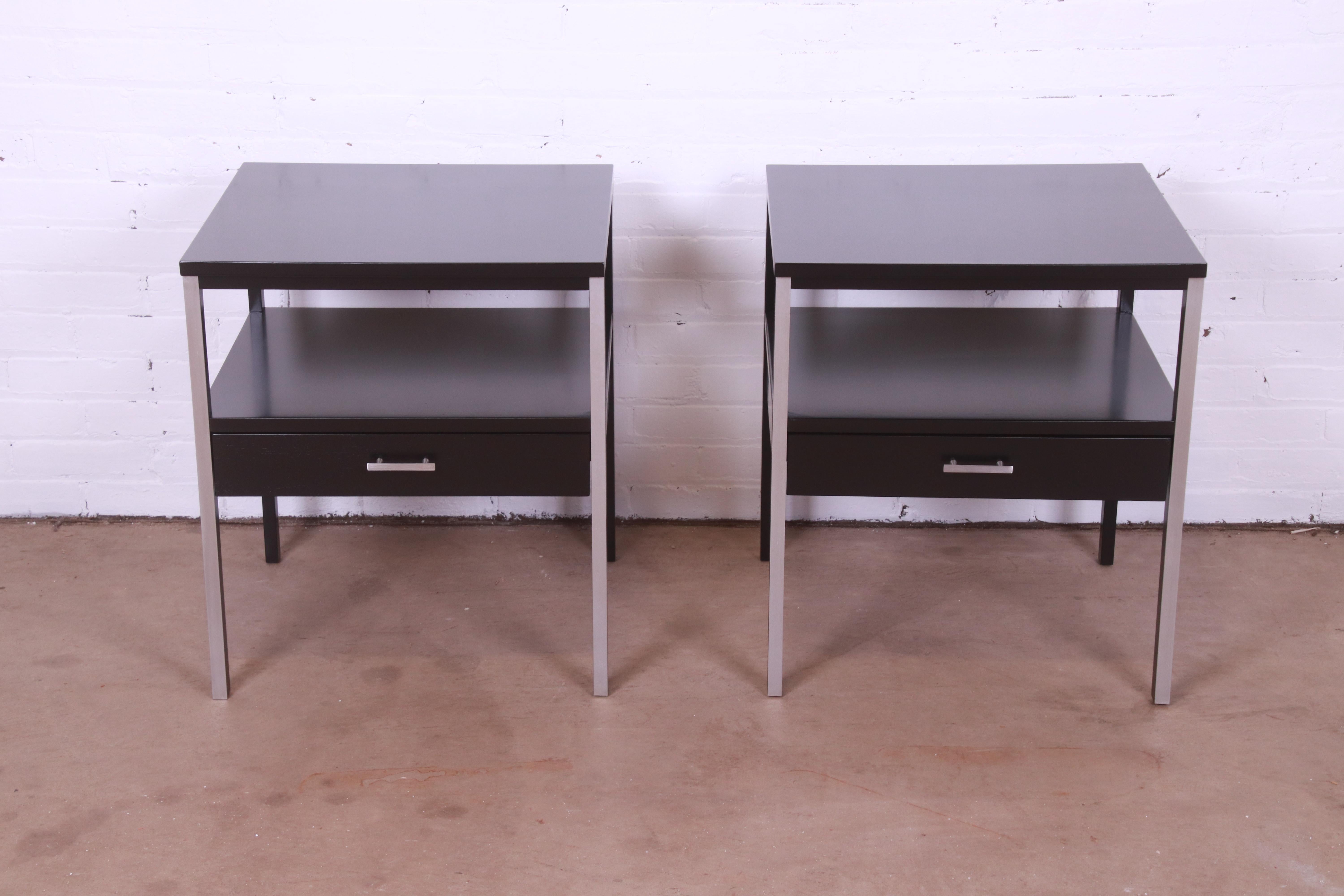 A sleek and stylish pair of Mid-Century Modern two-tier single drawer nightstands or end tables

By Paul McCobb for Calvin Furniture, 