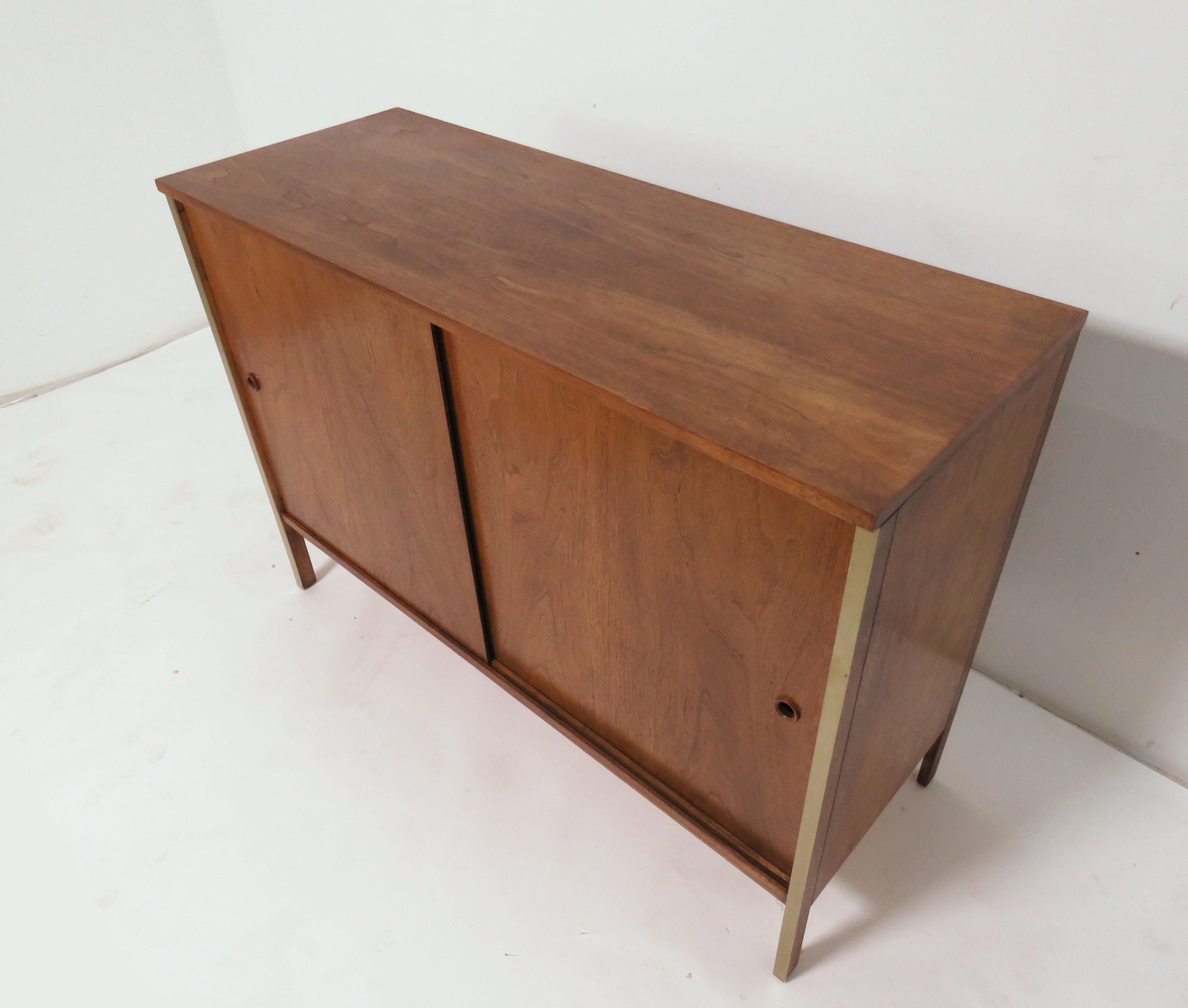 A Classic two-door cabinet designed by Paul McCobb for Calvin Furniture, circa early 1960s.