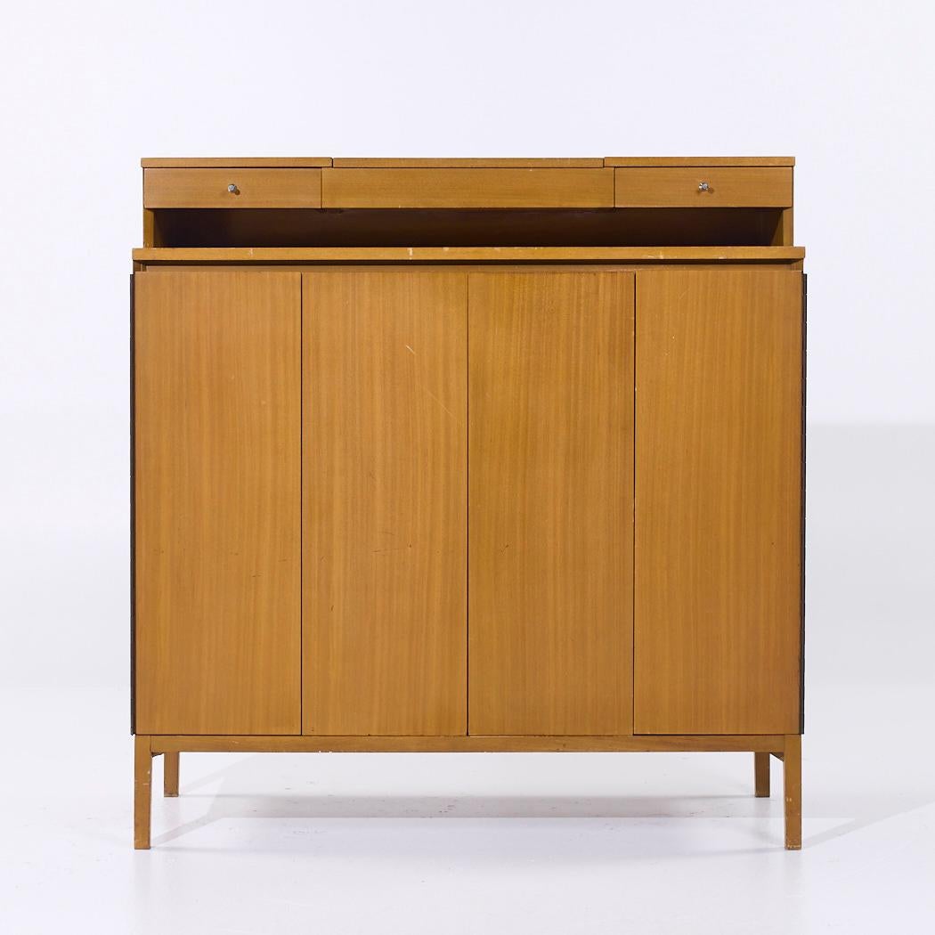Paul McCobb for Calvin Irwin Collection Mid Century Walnut Gentleman's Chest Dresser

This gentleman’s chest measures: 48 wide x 19 deep x 50 inches high

All pieces of furniture can be had in what we call restored vintage condition. That means the