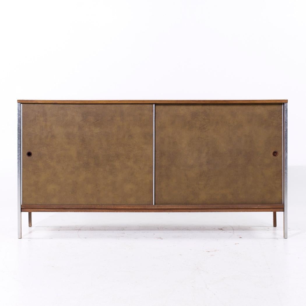 Paul McCobb for Calvin Linear Mid Century Walnut Credenza

This credenza measures: 66 wide x 18 deep x 34 inches high

We take our photos in a controlled lighting studio to show as much detail as possible. We do not Photoshop out
