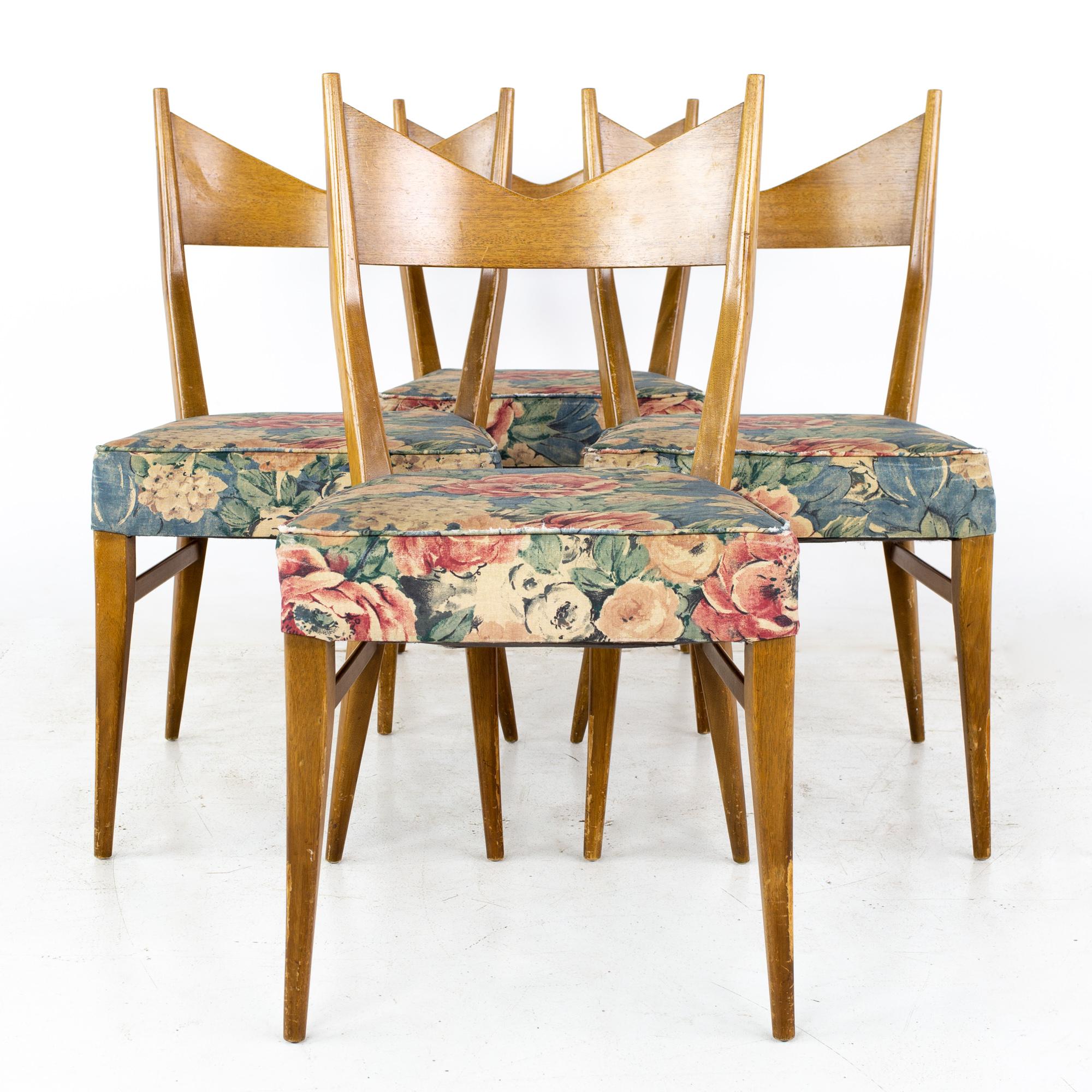 Paul McCobb for Calvin mid century bowtie walnut dining chairs - Set of 4
Each chair measures: 18.5 wide x 19 deep x 34 high, with a seat height of 19 inches and a chair clearance of 19 inches

All pieces of furniture can be had in what we call