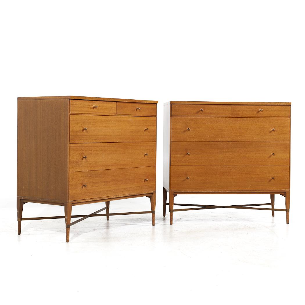 Paul McCobb for Calvin Mid Century Brass X Base Dresser Chest of Drawers - Pair

Each chest of drawers measures: 36 wide x 19.25 deep x 36.25 high

All pieces of furniture can be had in what we call restored vintage condition. That means the piece