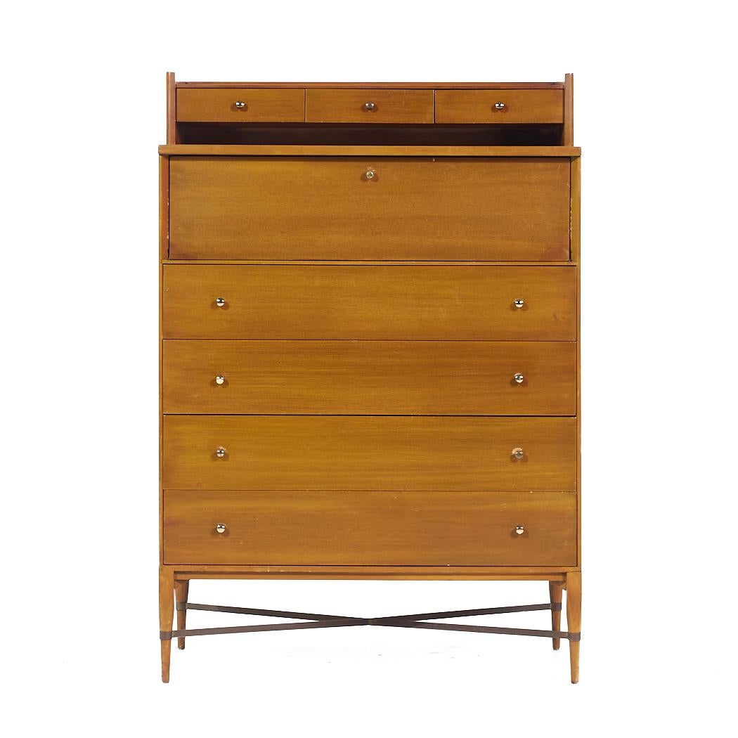Paul McCobb for Calvin Mid Century Gentleman's Highboy Dresser

This highboy measures: 36 wide x 19.25 deep x 52.75 inches high

All pieces of furniture can be had in what we call restored vintage condition. That means the piece is restored upon