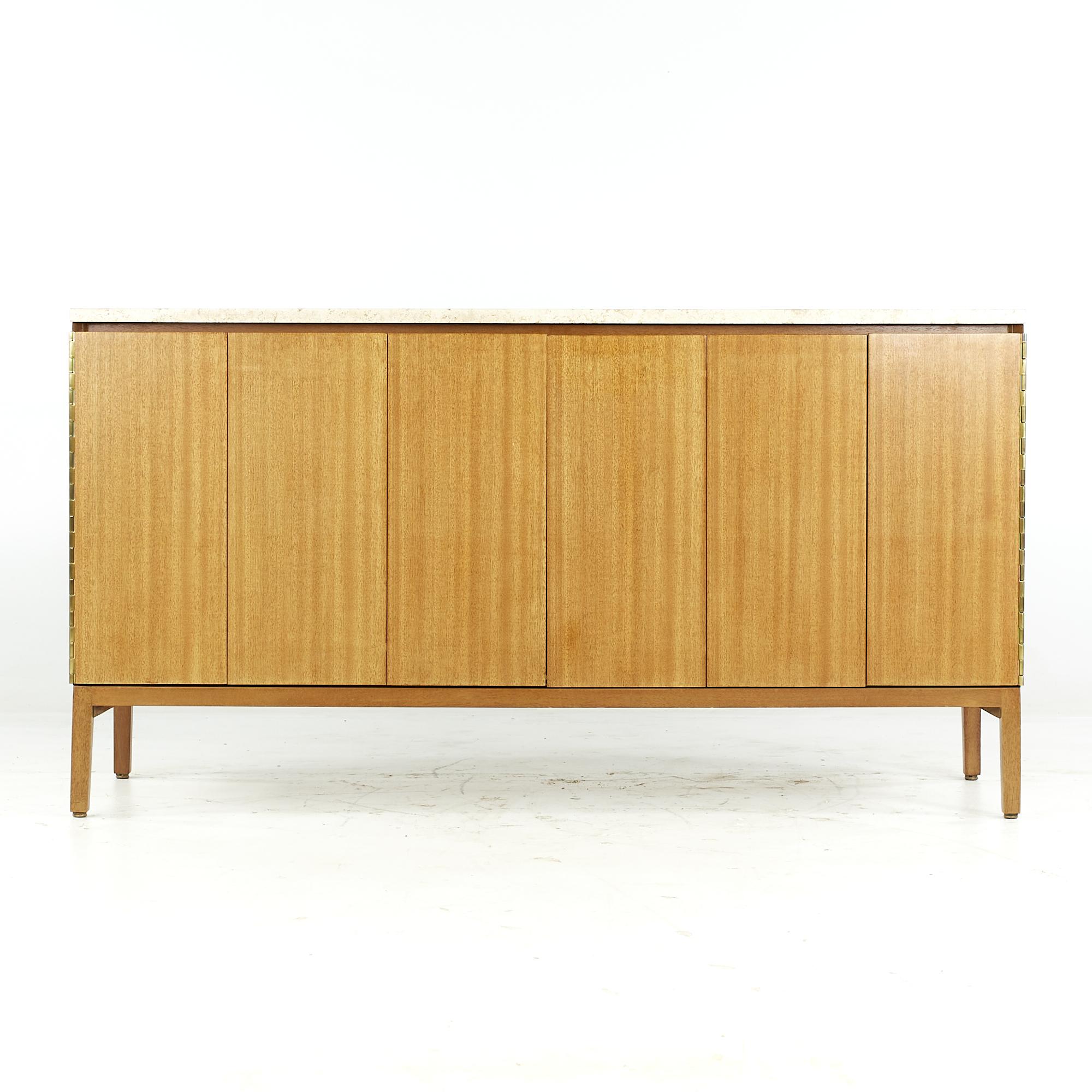 Paul McCobb for Calvin midcentury Mahogany and Travertine Top Credenza

This credenza measures: 60.25 wide x 19 deep x 32.25 inches high

All pieces of furniture can be had in what we call restored vintage condition. That means the piece is