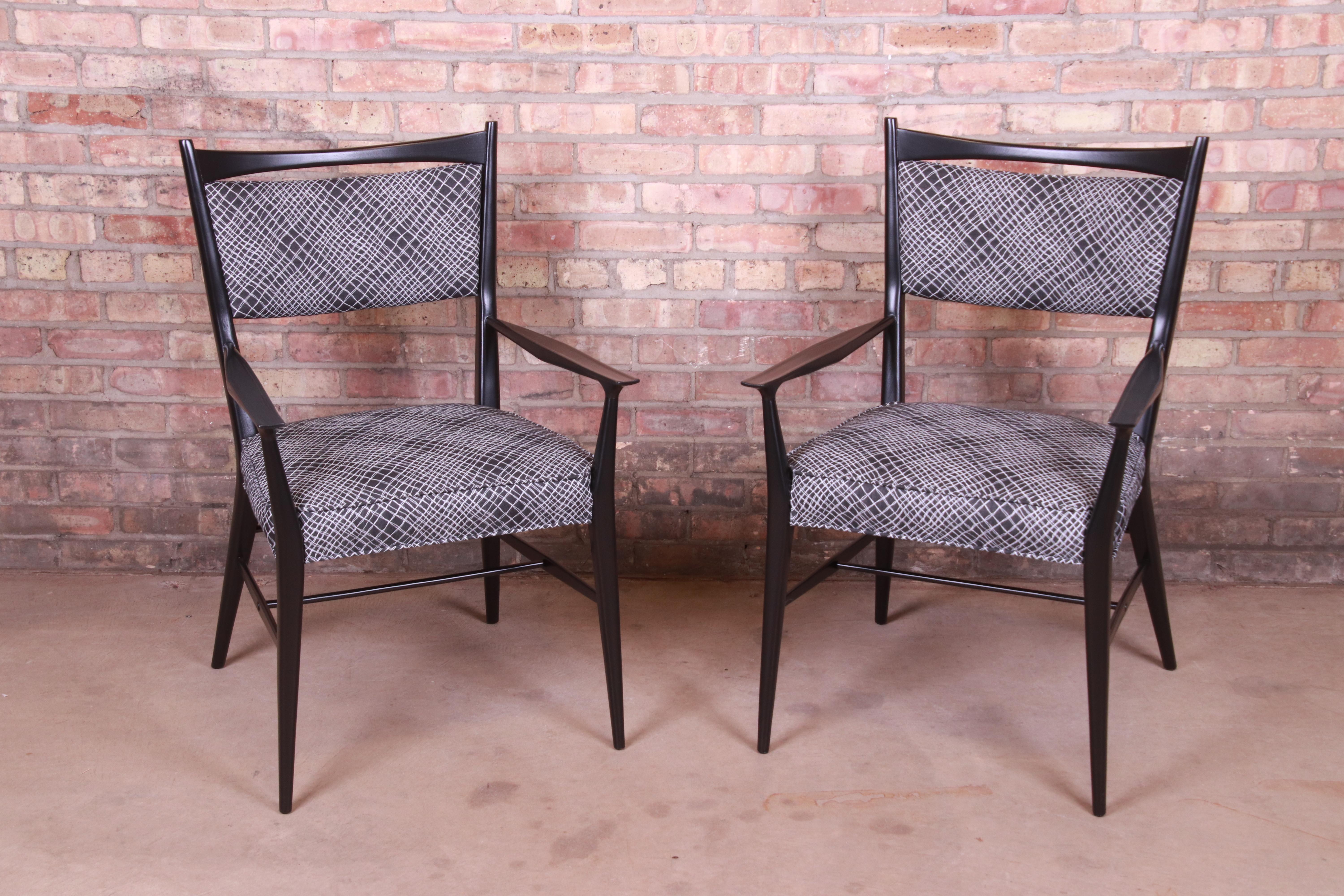 A gorgeous pair of Mid-Century Modern club chairs or dining armchairs

By Paul McCobb for Calvin Furniture,

USA, 1950s

Black lacquered walnut frames, with upholstered seats and backs.

Measures: 22.88
