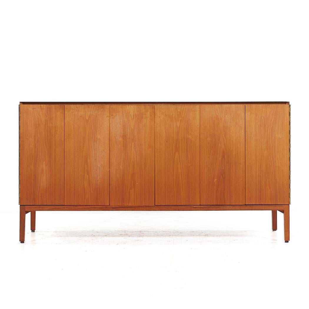 Paul McCobb for Calvin Mid Century Vitrolite and Bleached Mahogany Credenza

This credenza measures: 60 wide x 19 deep x 32.25 inches high

All pieces of furniture can be had in what we call restored vintage condition. That means the piece is