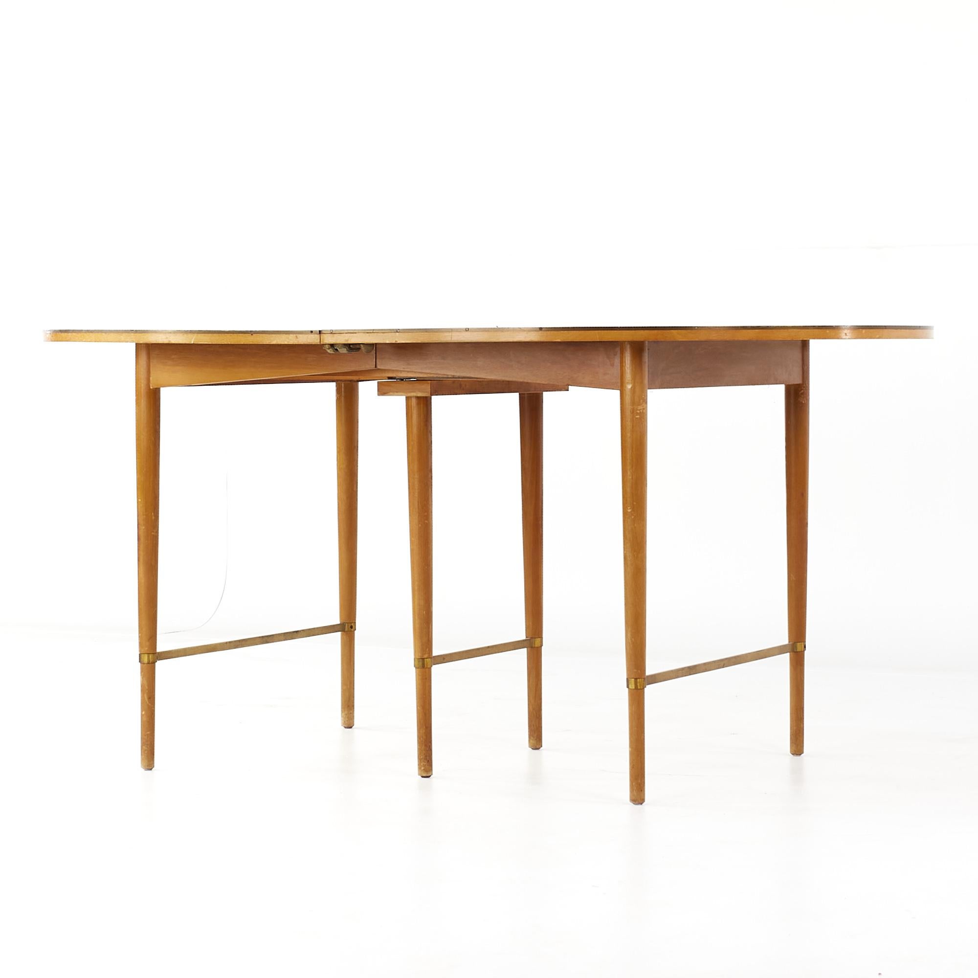Mid-Century Modern Paul McCobb for Calvin Mid Century Walnut and Brass Dining Table with 6 Leaves For Sale