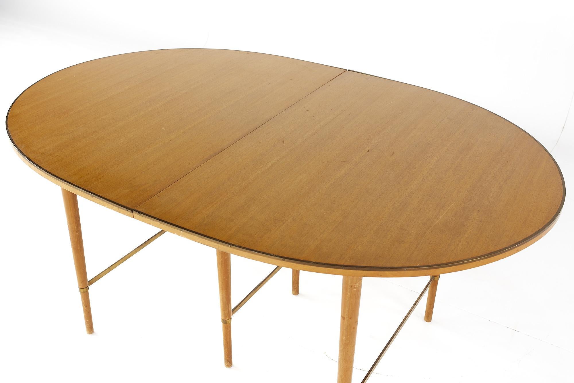 American Paul McCobb for Calvin Mid Century Walnut and Brass Dining Table with 6 Leaves For Sale