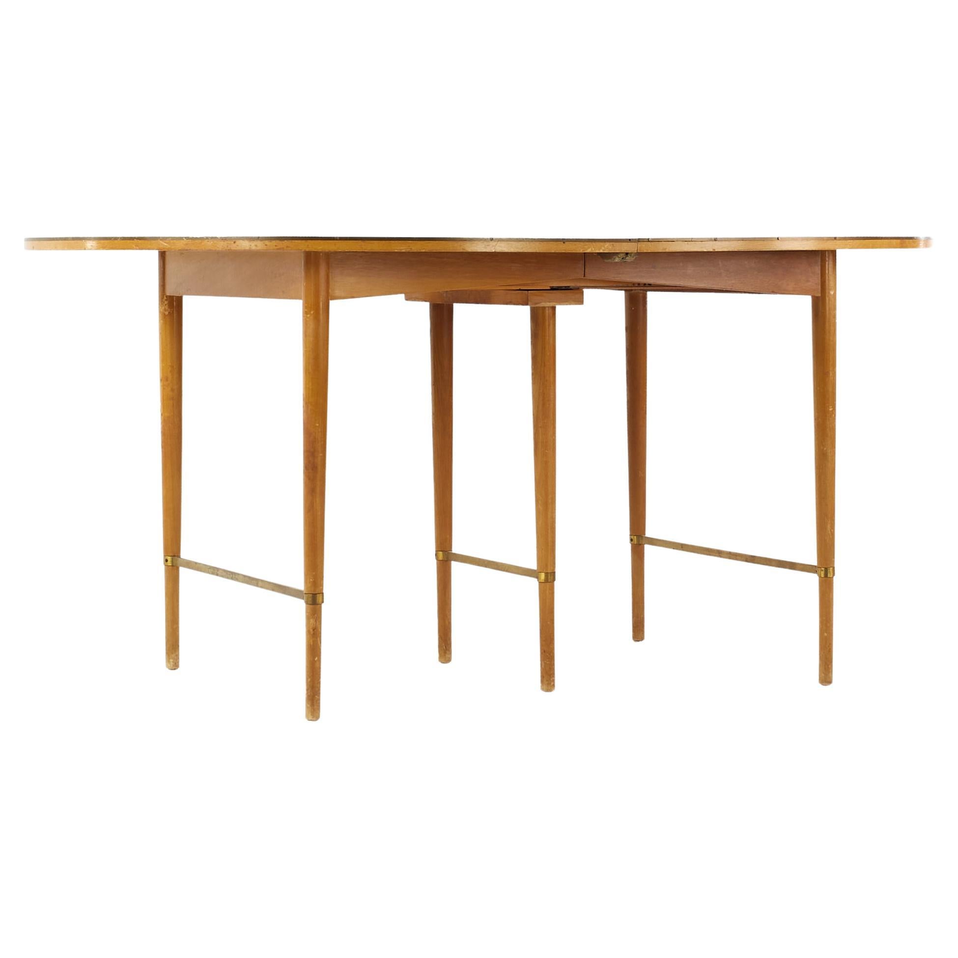 Paul McCobb for Calvin Mid Century Walnut and Brass Dining Table with 6 Leaves