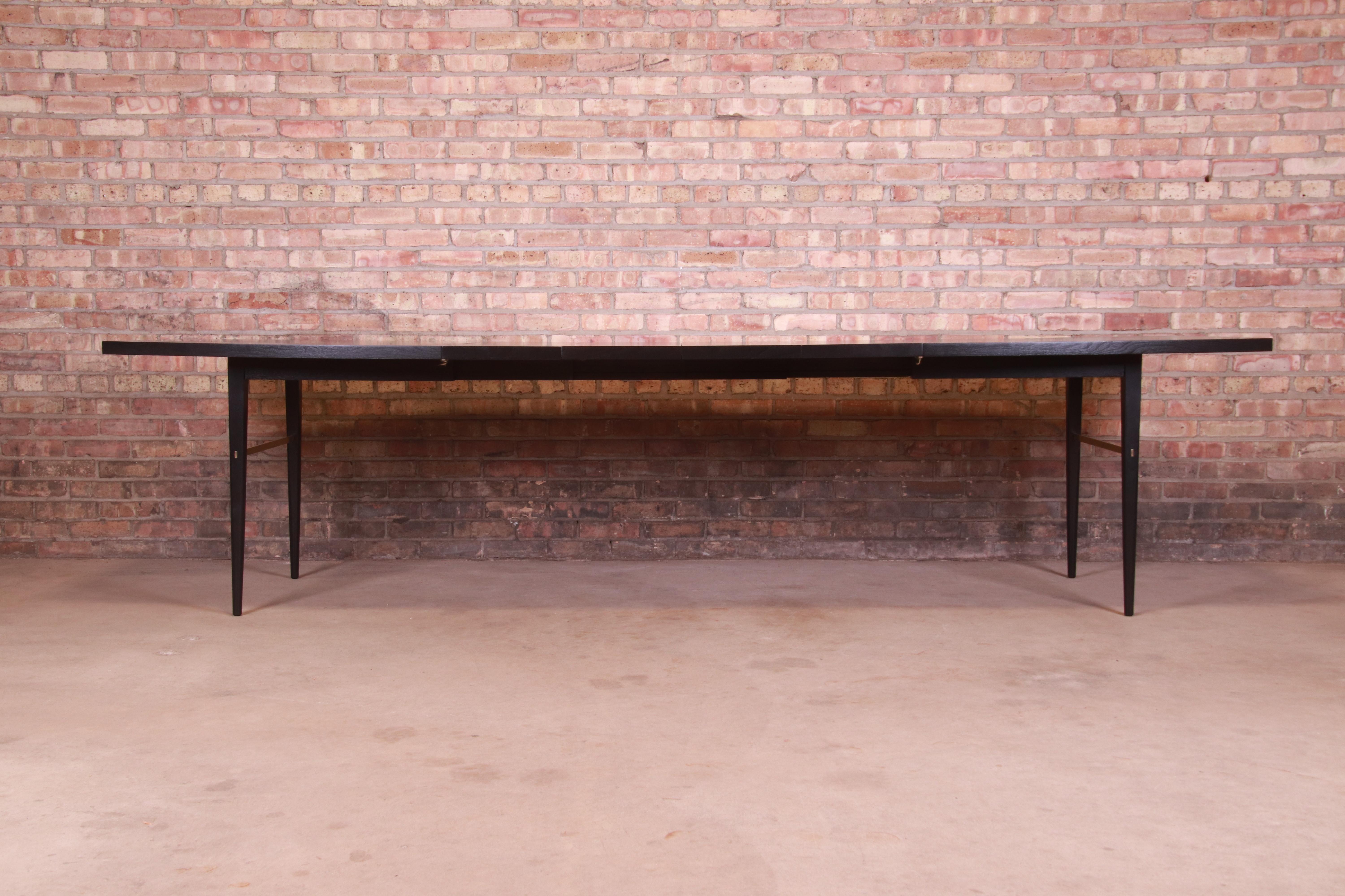 Mid-Century Modern Paul McCobb for Directional Black Lacquer and Brass Boat-Shaped Dining Table