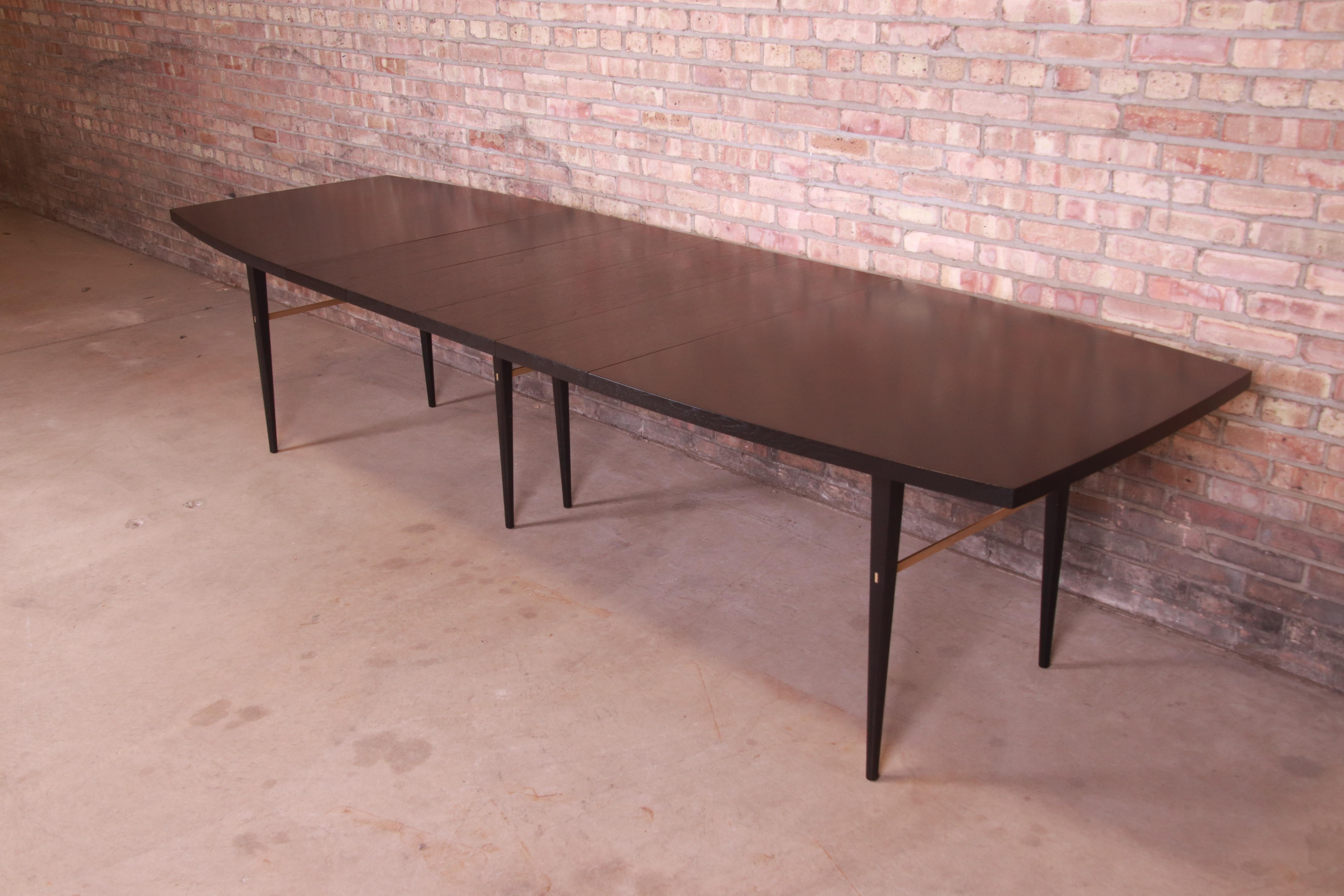 American Paul McCobb for Directional Black Lacquer and Brass Boat-Shaped Dining Table