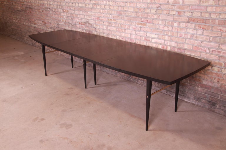 American Paul McCobb for Directional Black Lacquer and Brass Boat-Shaped Dining Table For Sale