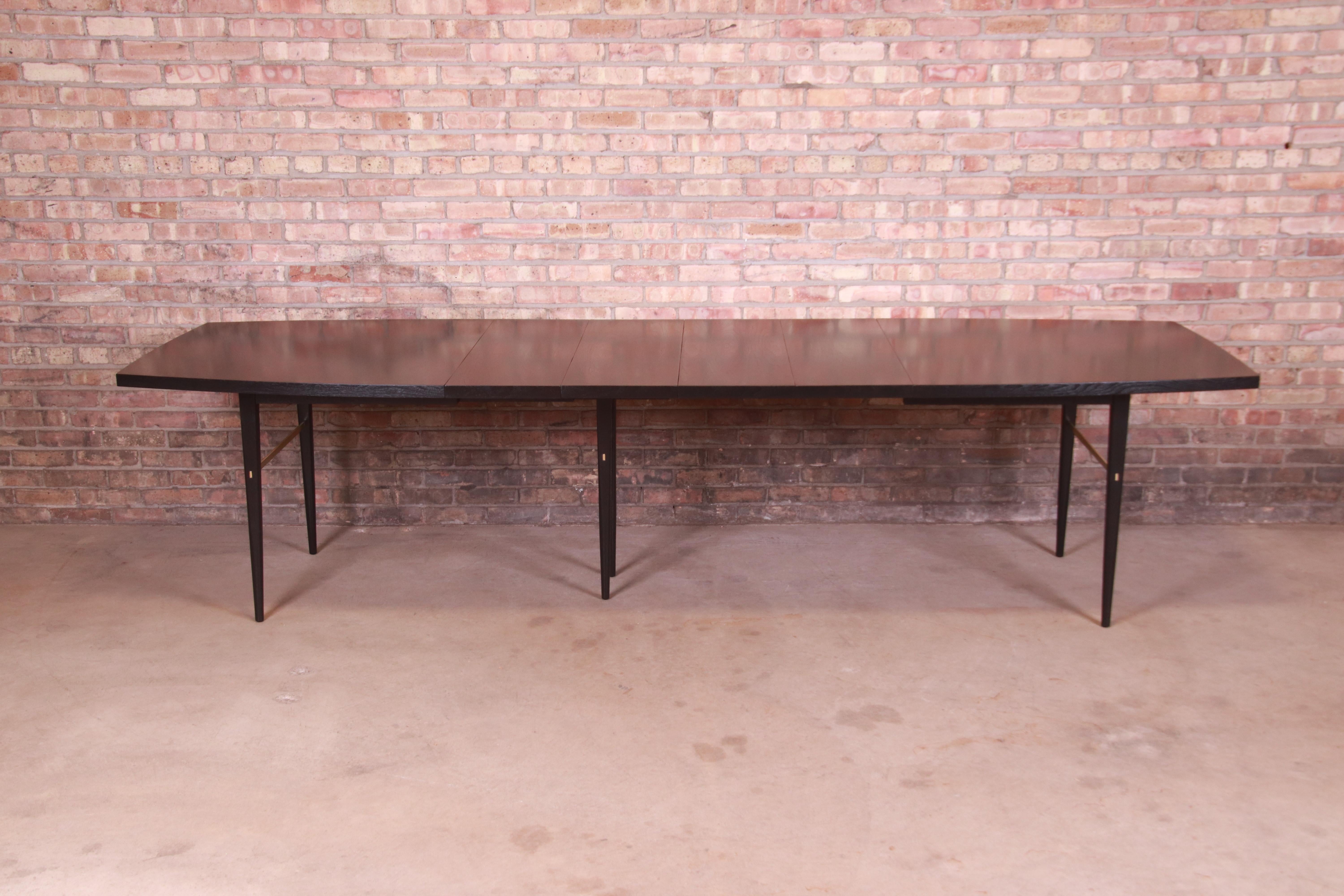 Mid-20th Century Paul McCobb for Directional Black Lacquer and Brass Boat-Shaped Dining Table