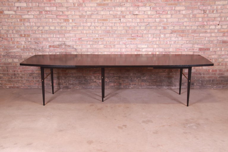 Mid-20th Century Paul McCobb for Directional Black Lacquer and Brass Boat-Shaped Dining Table For Sale