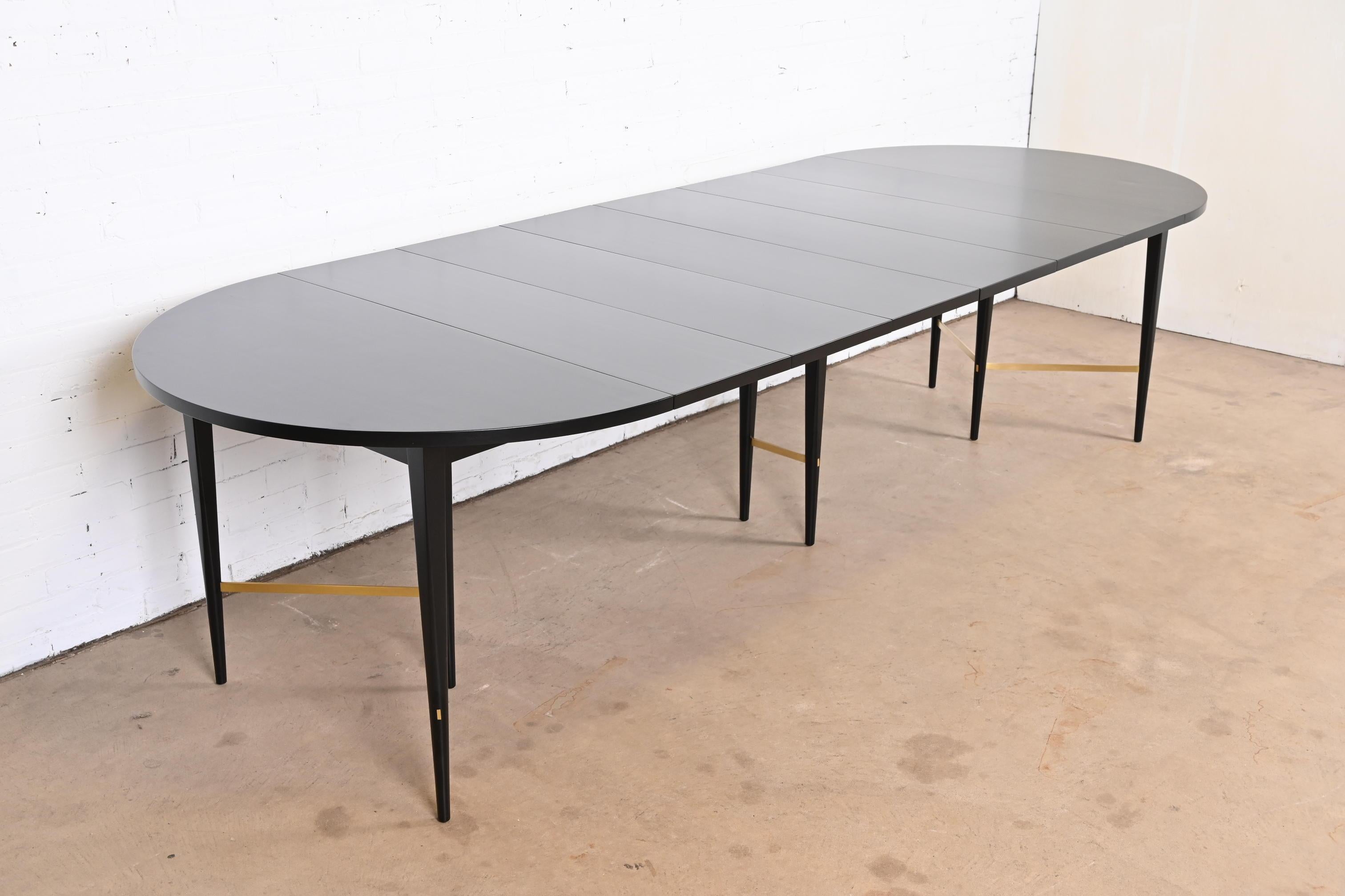 An exceptional and very versatile Mid-Century Modern extension dining table

By Paul McCobb for Directional and produced by Calvin Furniture, 