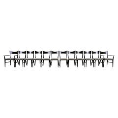 Paul McCobb lot de douze chaises de salle à manger en laque noire à nœud papillon pour Directional