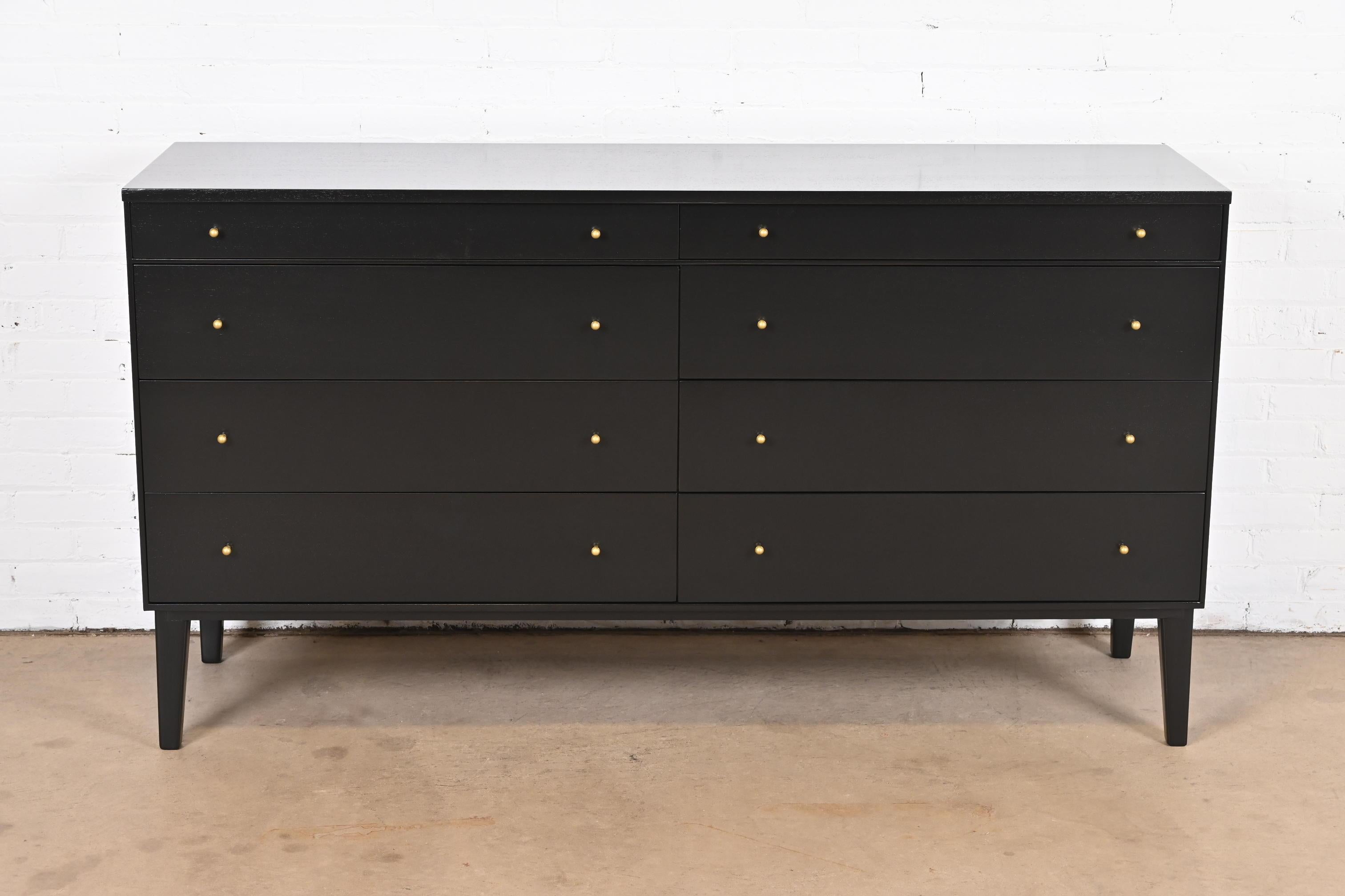 An exceptional Mid-Century Modern eight-drawer dresser or credenza

By Paul McCobb for Directional and produced by Calvin Furniture, 