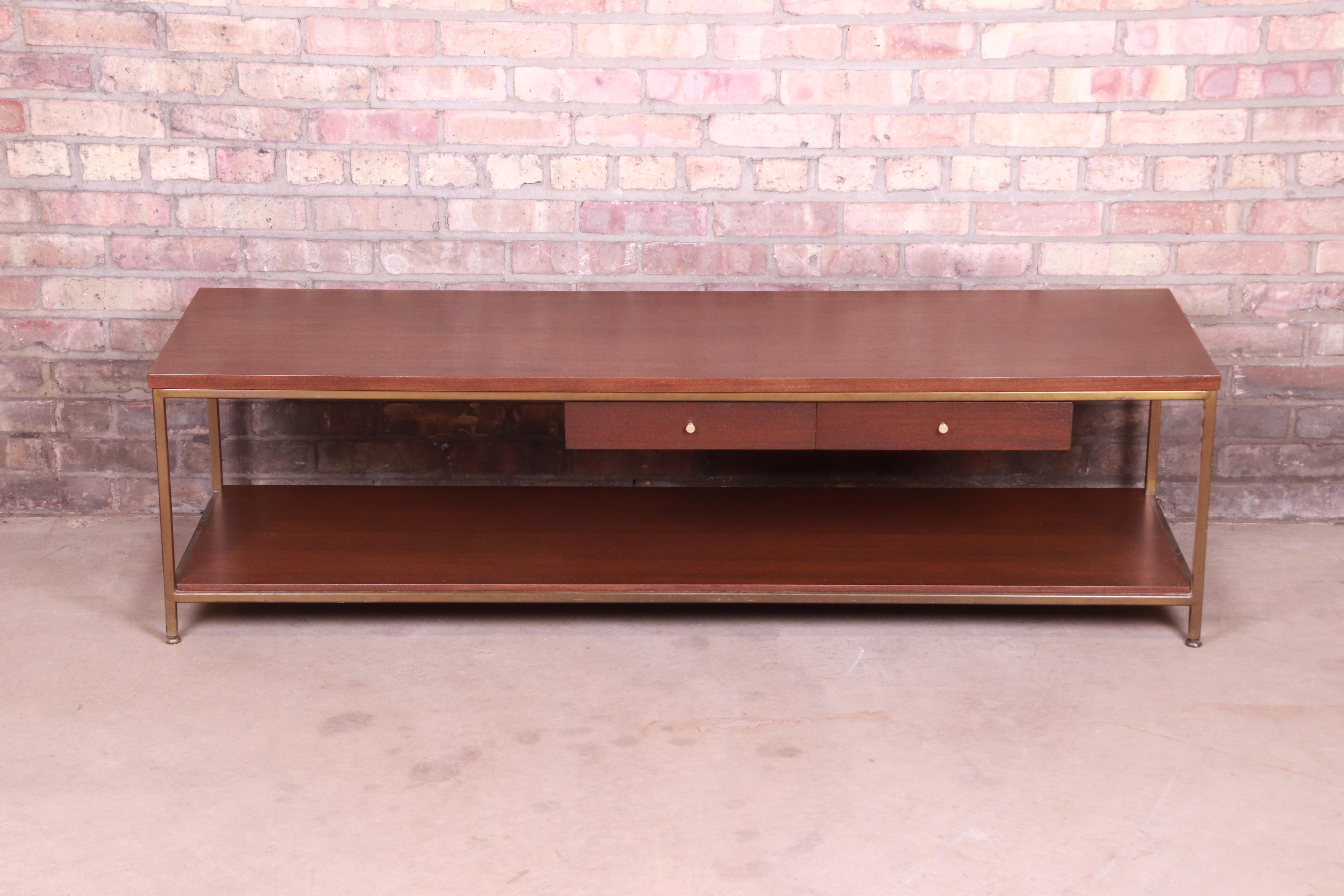 An exceptional Mid-Century Modern coffee or cocktail table with floating drawers

By Paul McCobb for Directional and produced by Calvin Furniture, 