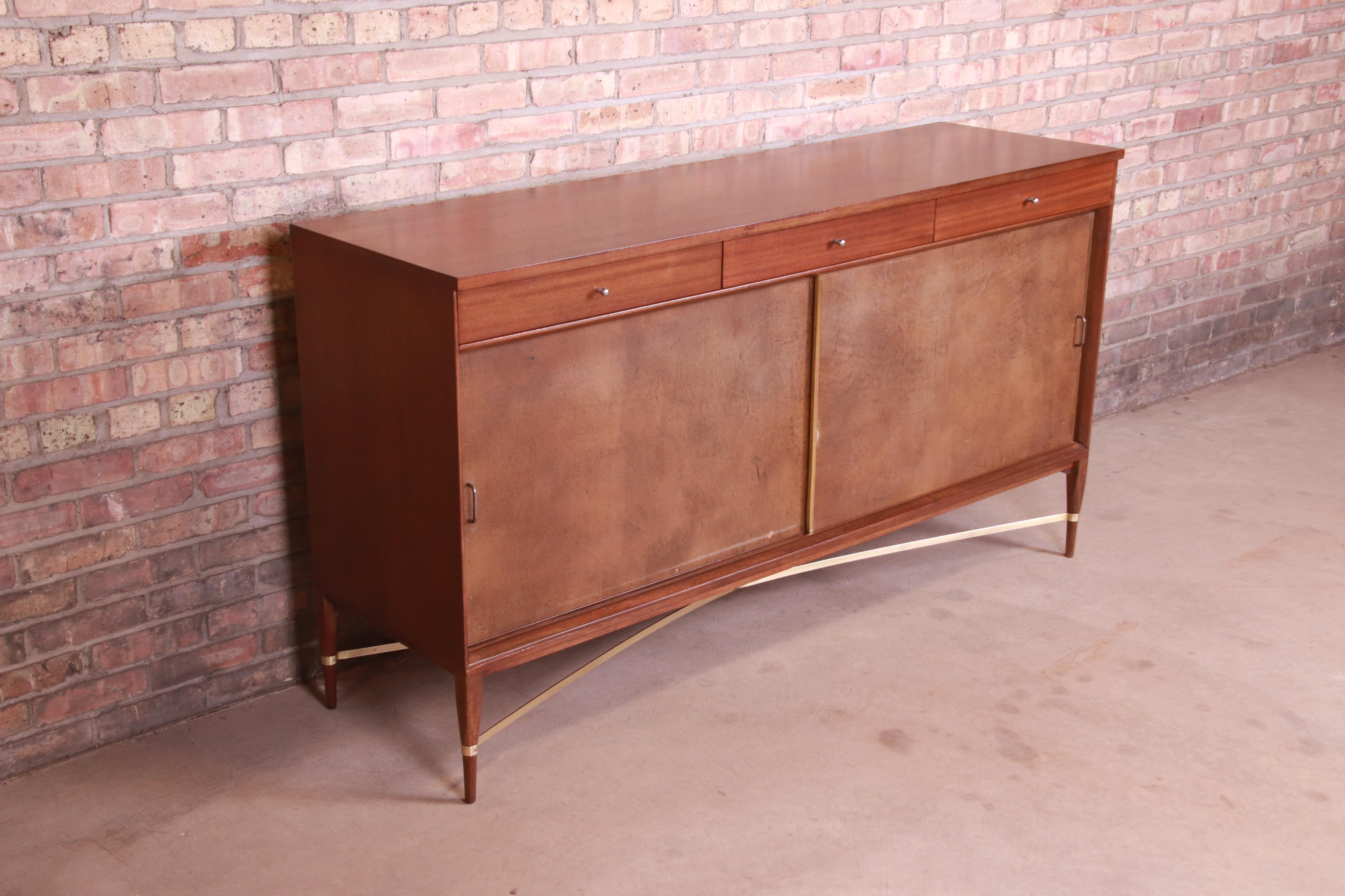 Paul McCobb for Directional Mahogany, Brass, and Leather Credenza, Refinished In Good Condition In South Bend, IN