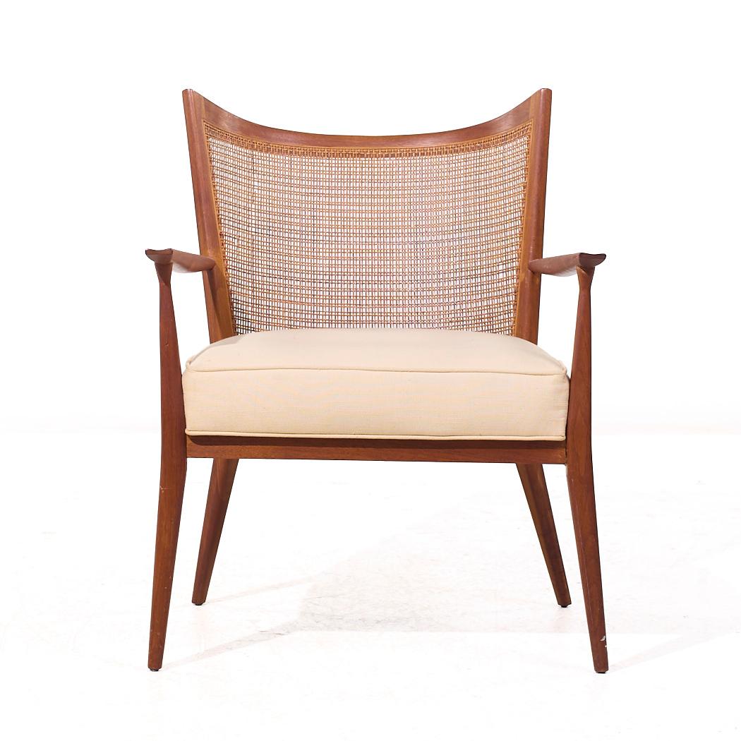 Paul McCobb for Directional Mid Century Walnut and Cane Lounge Chair (Chaise longue en noyer et canne)

Cette chaise longue mesure : 24,25 de large x 26,5 de profond x 31,5 de haut, avec une hauteur d'assise de 17 et une hauteur d'accoudoir/d'espace