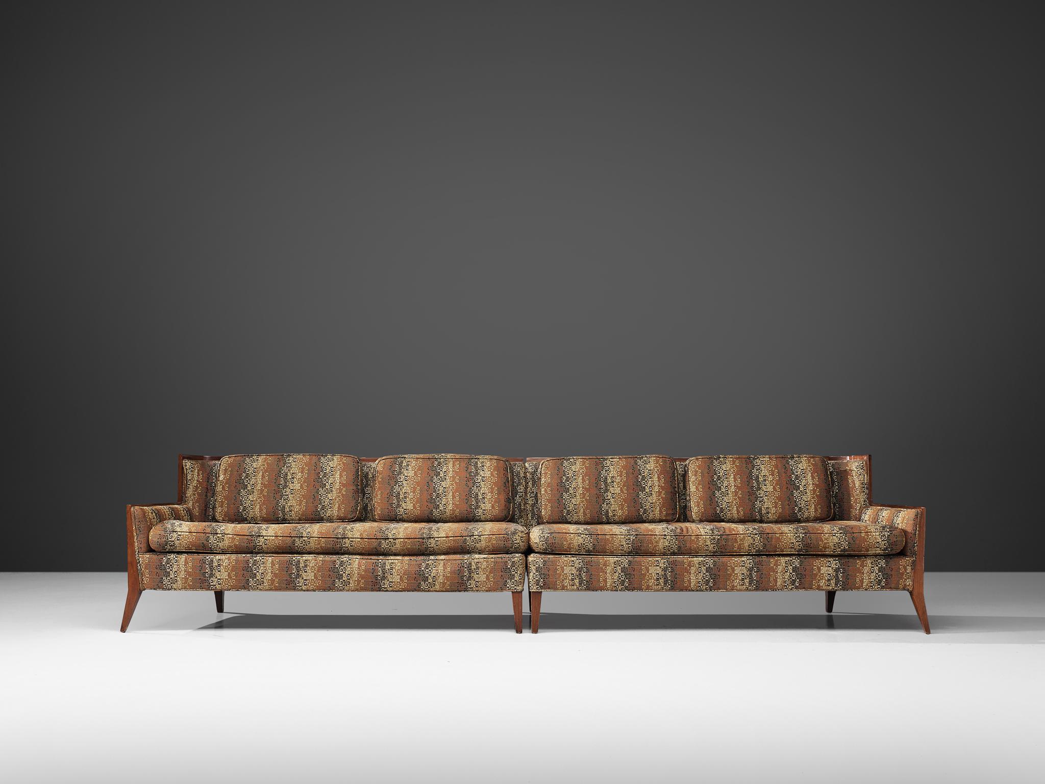 Paul McCobb for Directional, sectional sofa, patterned upholstery, walnut, United States, 1950s

A large sectional sofa, consisting of two elements designed by Paul McCobb for Directional. The two parts can either be placed next to each other and