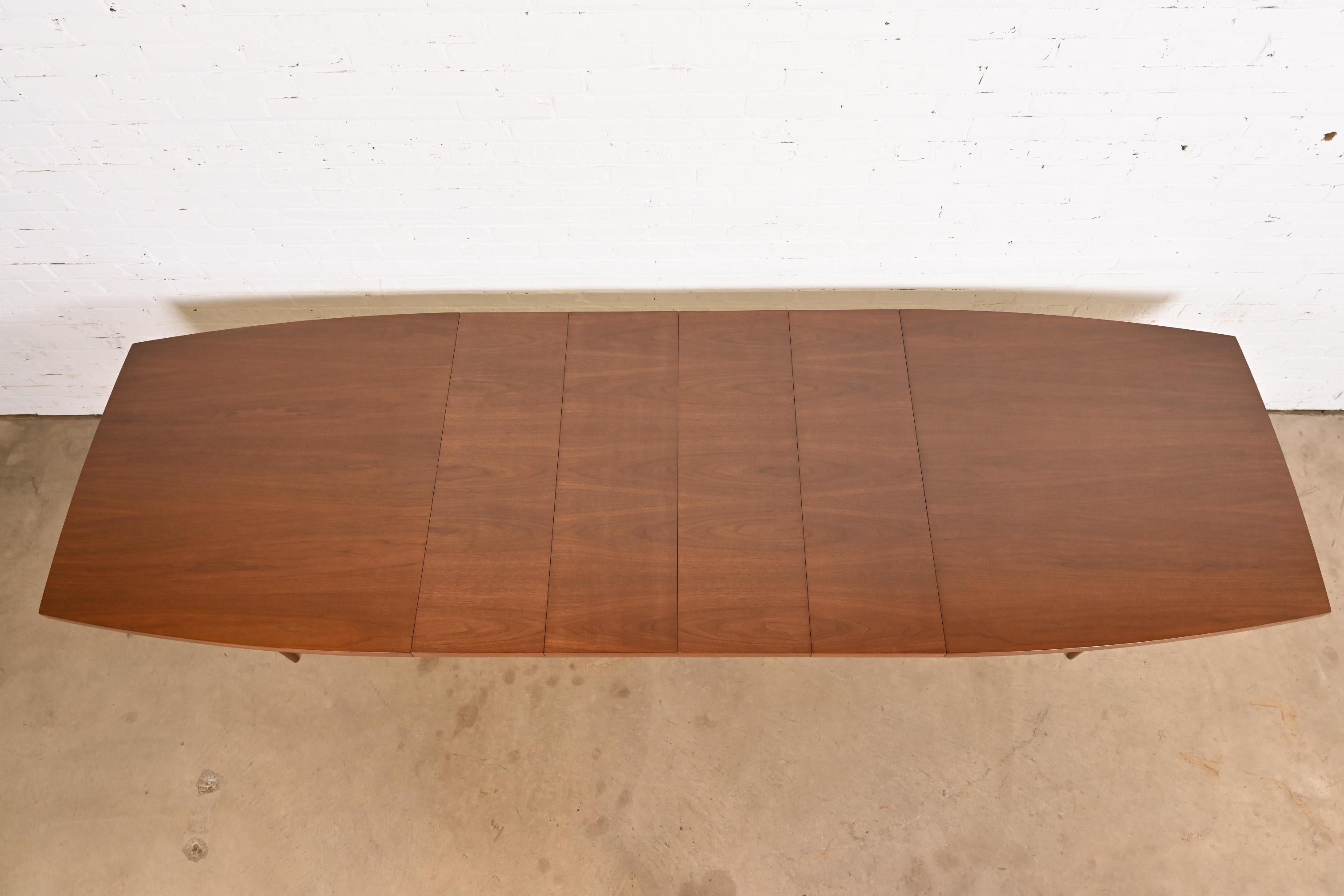 Mid-20th Century Paul McCobb for Directional Walnut and Brass Boat-Shaped Extension Dining Table