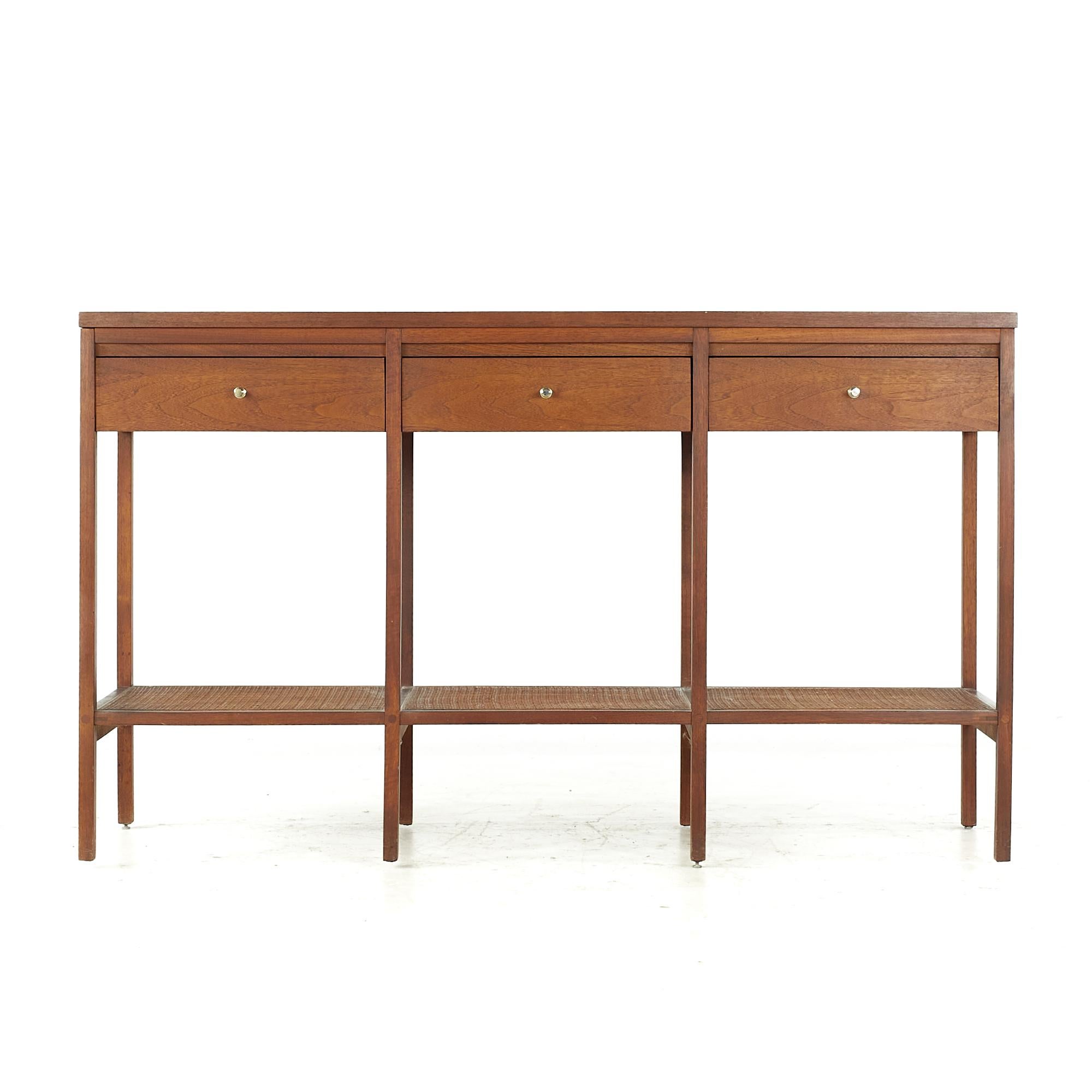 Paul McCobb for Lane Delineator midcentury Rosewood and Cane Console Table

This console table measures: 54.25 wide x 18 deep x 32.25 inches high

All pieces of furniture can be had in what we call restored vintage condition. That means the