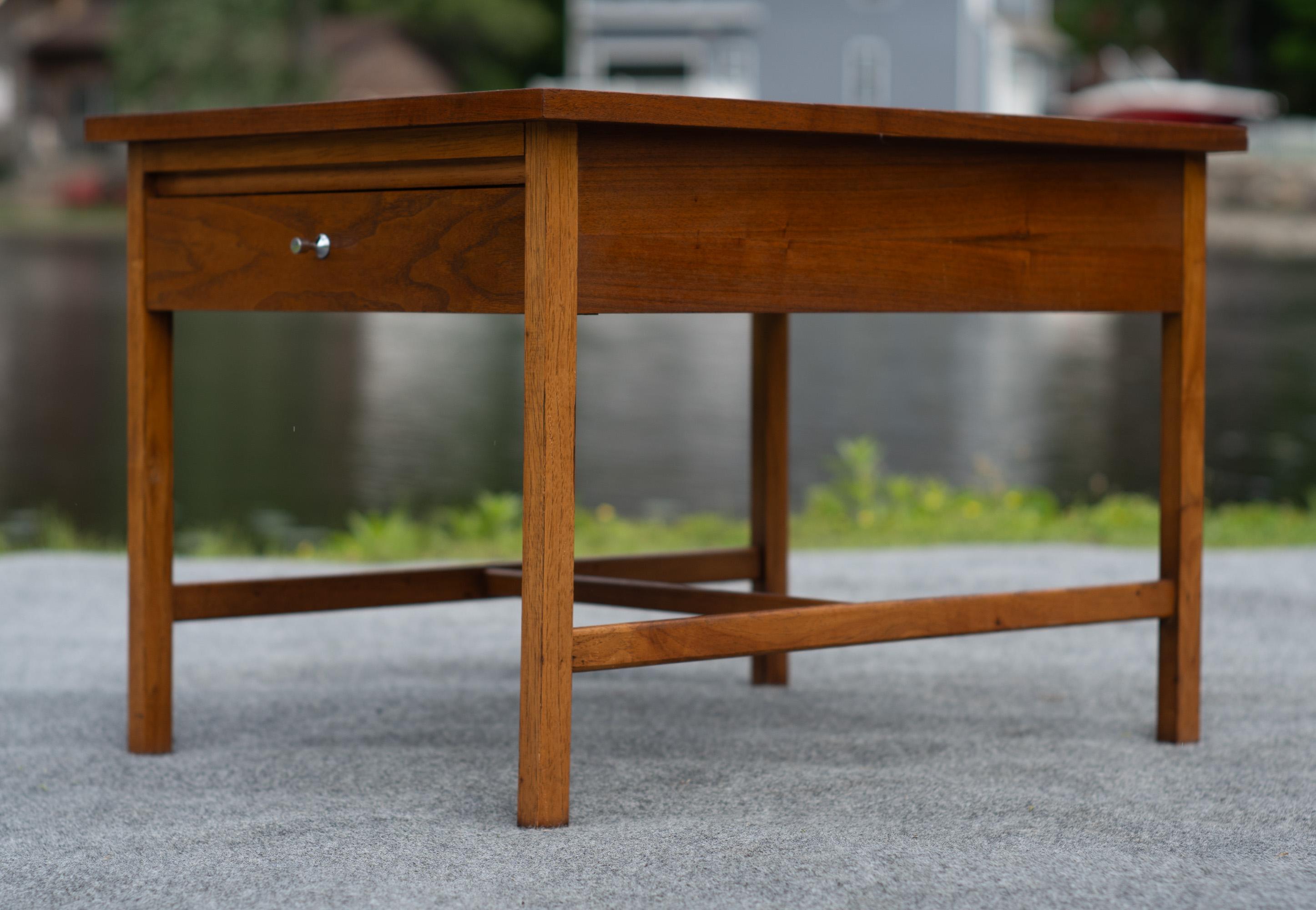 Designed and made in Altavista, VA by Lane Furniture, this side or end table was designed by American icon Paul McCobb. With thousands of designs under his belt, the 'Delineator' line stands near the top, with wonderfully sophisticated design and