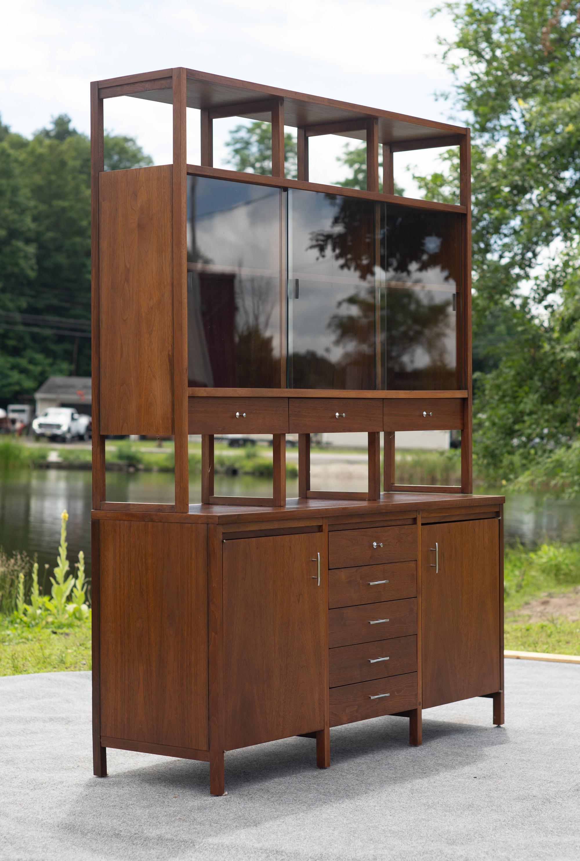 Designed and made in the USA, this piece stands among the most monumental by Paul McCobb. With an angular and architectural design ethos, and Lane's customary high quality, this piece will complete any dining or living room, especially with the