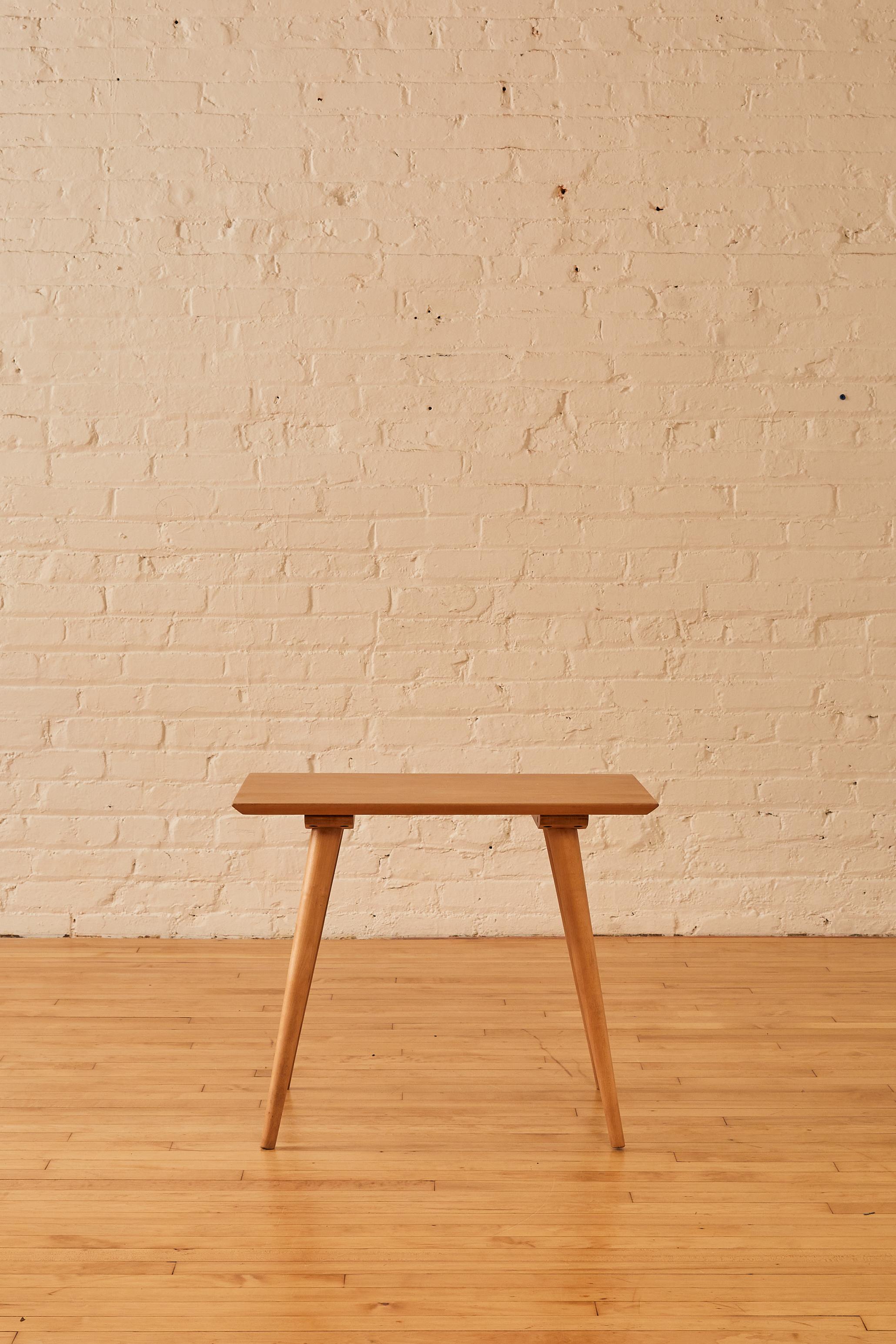 Maple Side Table by Paul McCobb for Planner Group with tapered legs.

