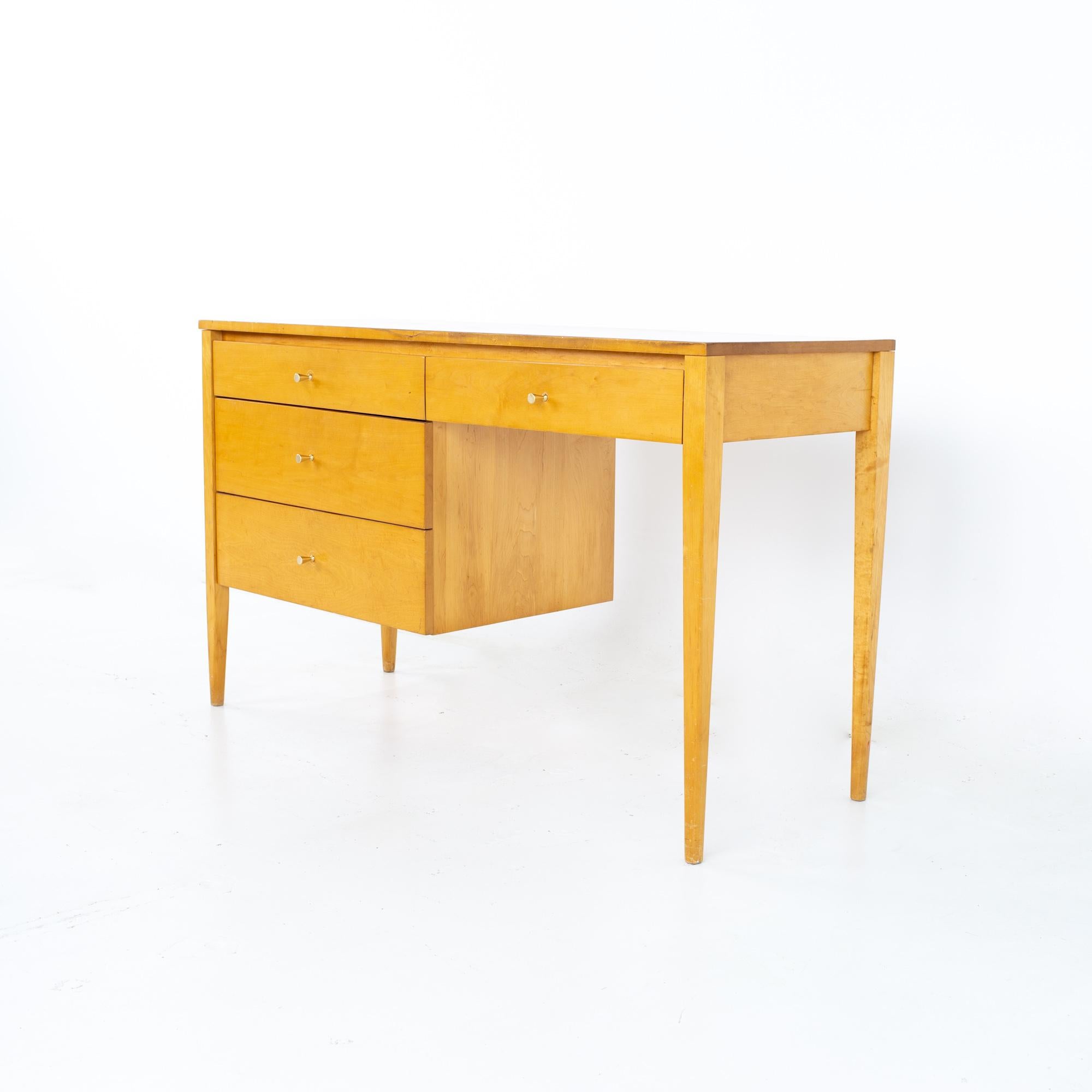 Paul McCobb for Planner Group mid century blonde 4 drawer desk.
Desk measures: 48 wide x 18.25 deep x 29 inches high

All pieces of furniture can be had in what we call restored vintage condition. That means the piece is restored upon purchase so