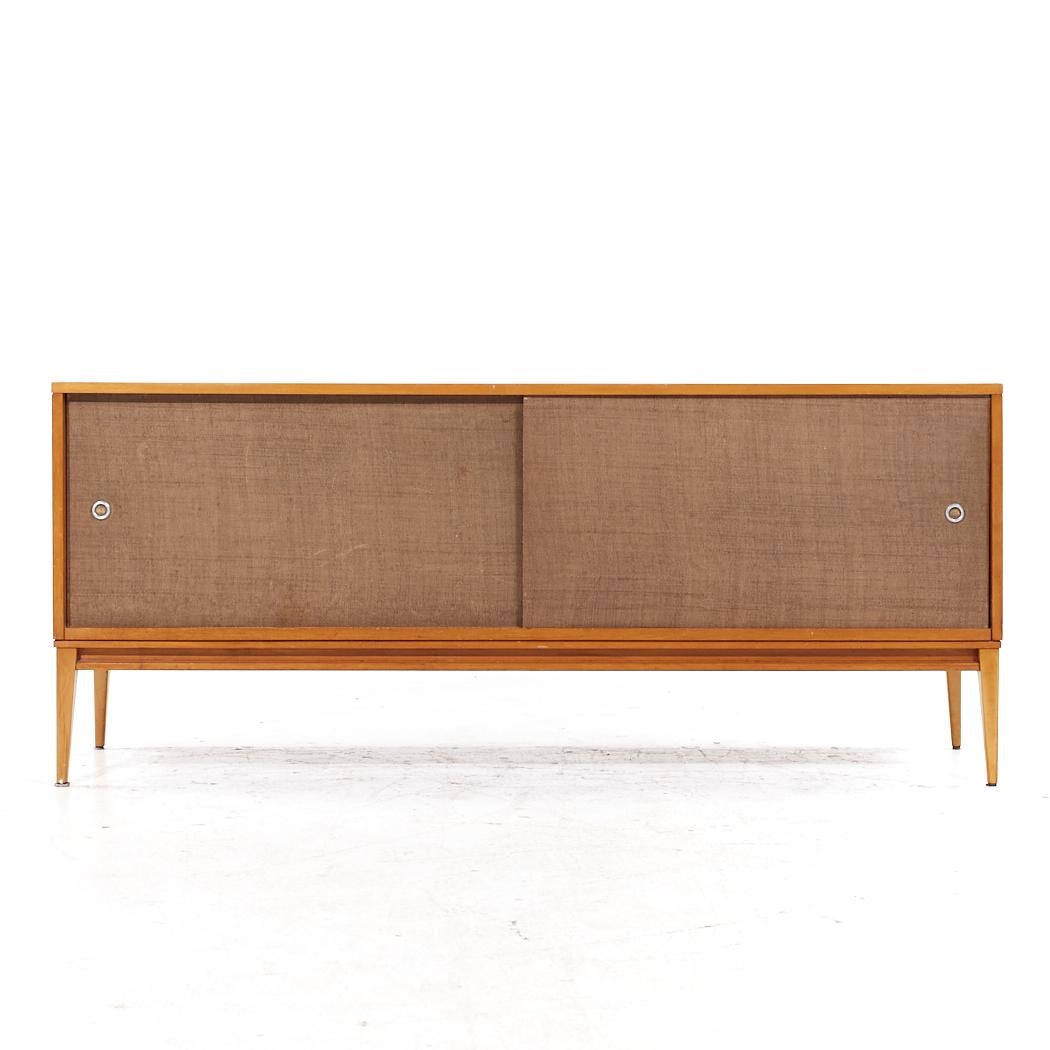 Paul McCobb for Planner Group Mid Century Sliding Door Credenza

This credenza measures: 60 wide x 18.25 deep x 25.5 inches high

All pieces of furniture can be had in what we call restored vintage condition. That means the piece is restored upon