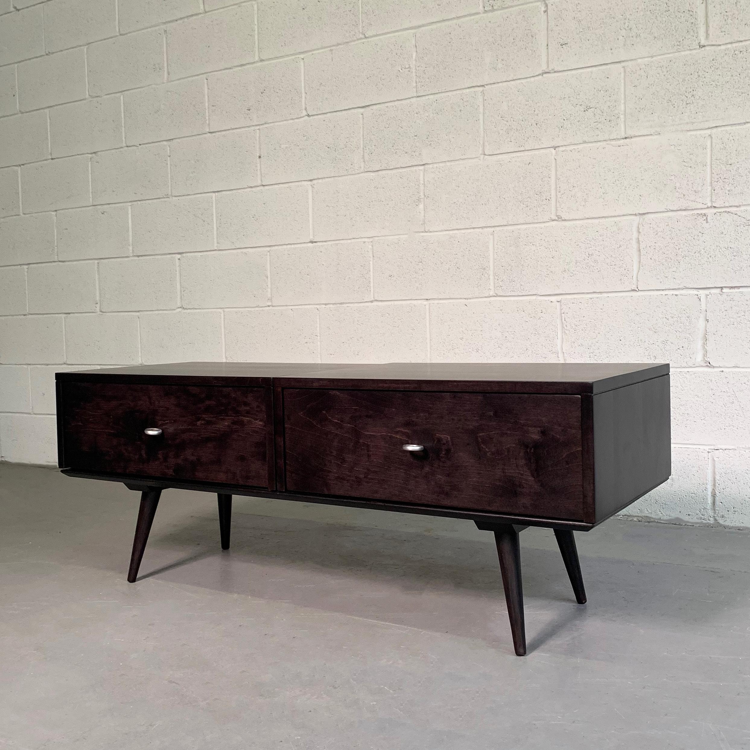 Mid-Century Modern, modular dresser system by Paul McCobb for Planner Group, Winchendon features two 24 x 18 x 8.5 inch dressers with signature aluminum ring pulls, that can be positioned side by side for 18.5