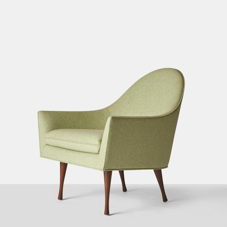 A Rounded Back lounge chair From the Symmetric Series
by Widdicomb Furniture. Manufactured for just a short time in 1960 and 1961. Redone in a Celery Wool Felt.