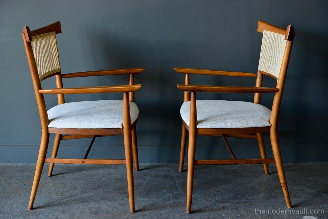 Paul McCobb for Winchendon cane back armchairs, circa 1955. Maple frames with cane backs and ivory fabric seats. Very good original condition, cane is perfect with no breaks.

Measure 23